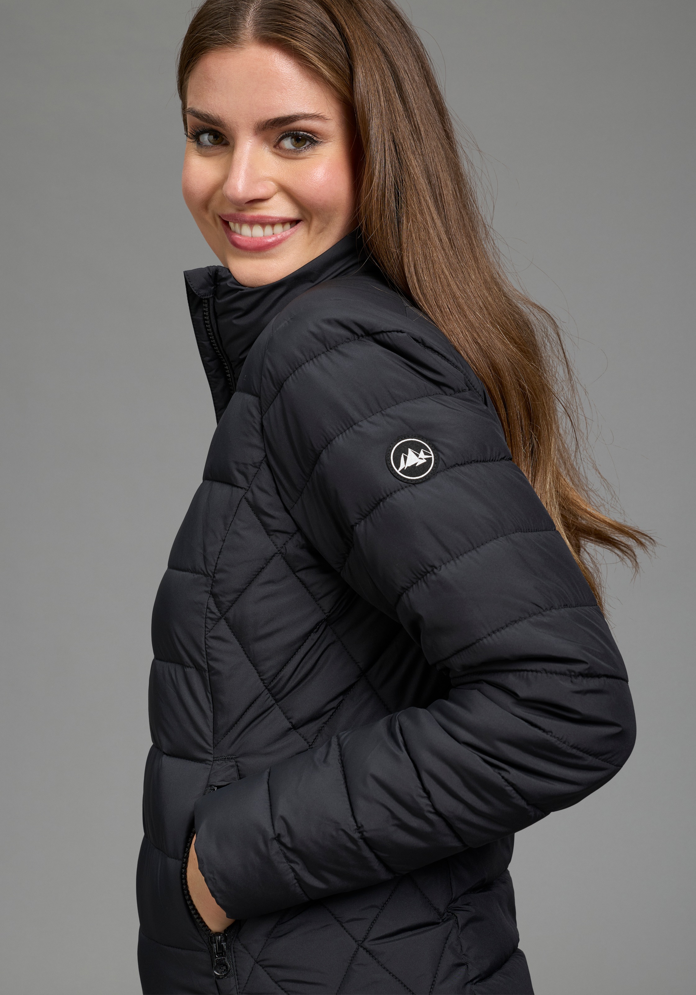 Polarino Steppjacke hüftlang geschnitten, wärmeisolierend, winddicht, mit Stehkragen