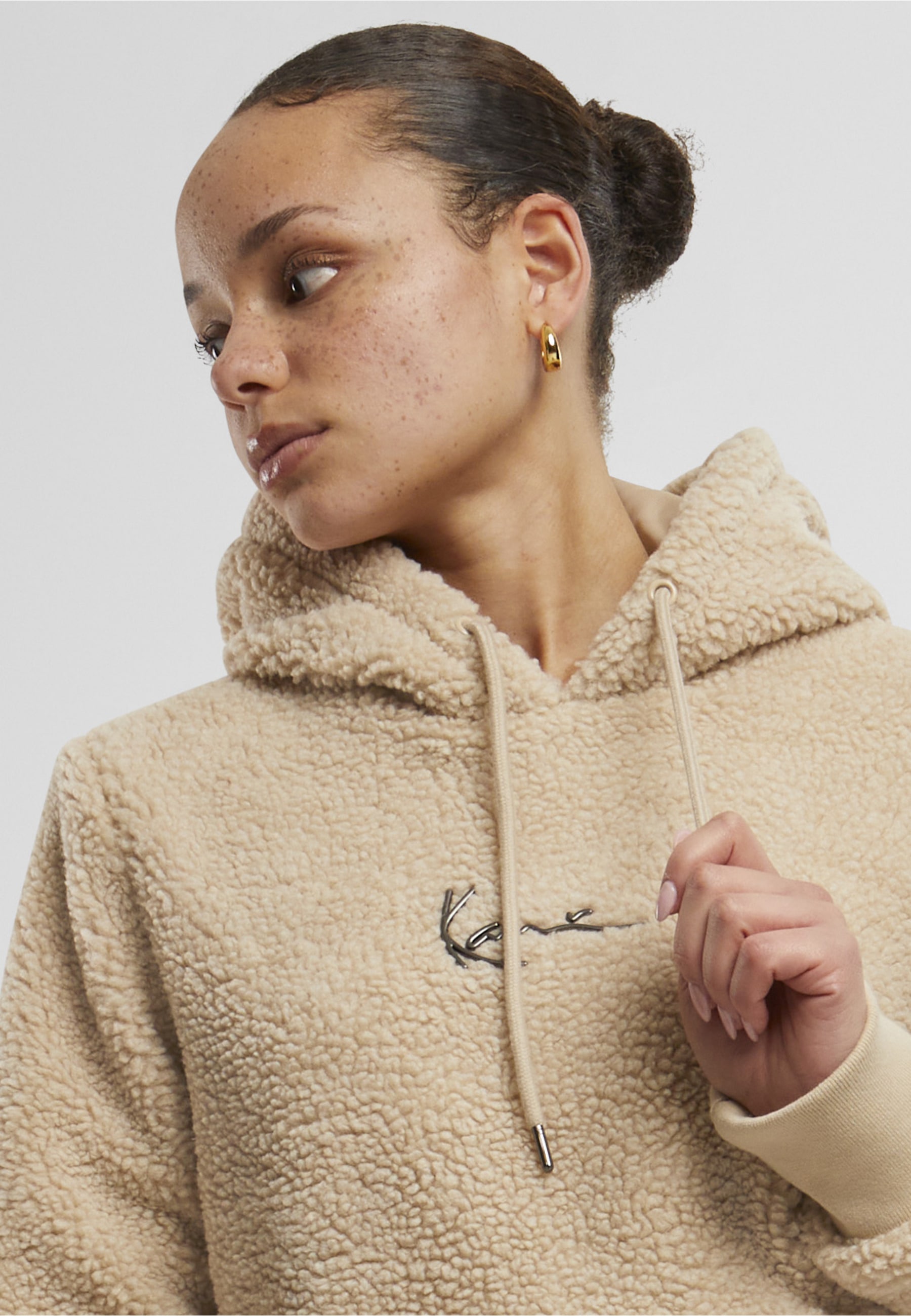 Karl Kani Kapuzenpullover »Karl Kani KKWQ42044 Small Signature Teddy Hoodie« 1 tlg.