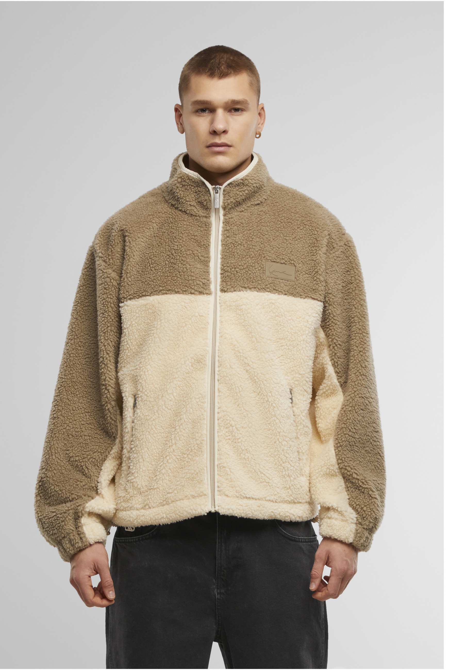 Karl Kani Winterjacke »Karl Kani Signature Rubber Patch Teddy Zip Jacket« 1 Stk. tlg. ohne Kapuze