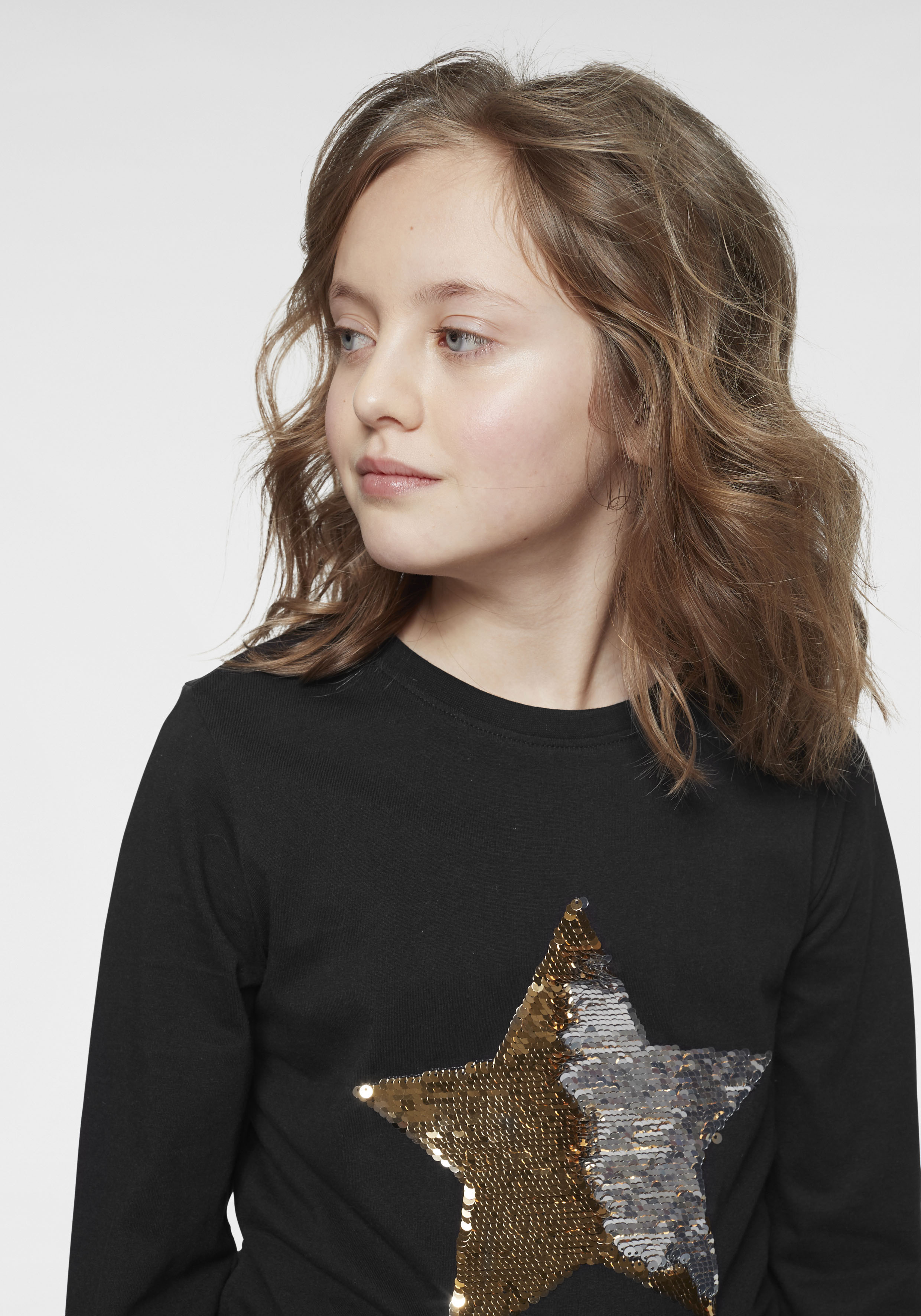 Thumbnail - KIDSWORLD Langarmshirt "STERN" Langarm, taillierter Schnitt, mit glitzernden Pailletten