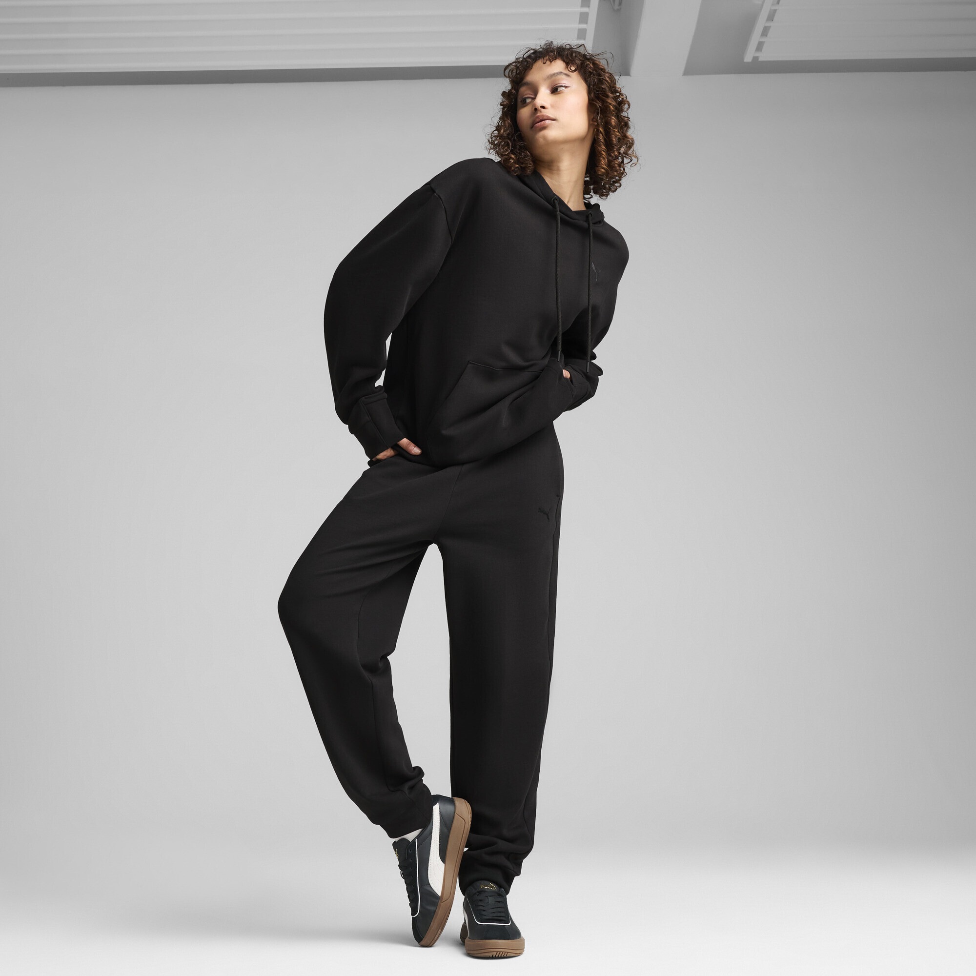 PUMA Sporthose »HER Comfort Hochgeschnittene Jogginghose Damen«