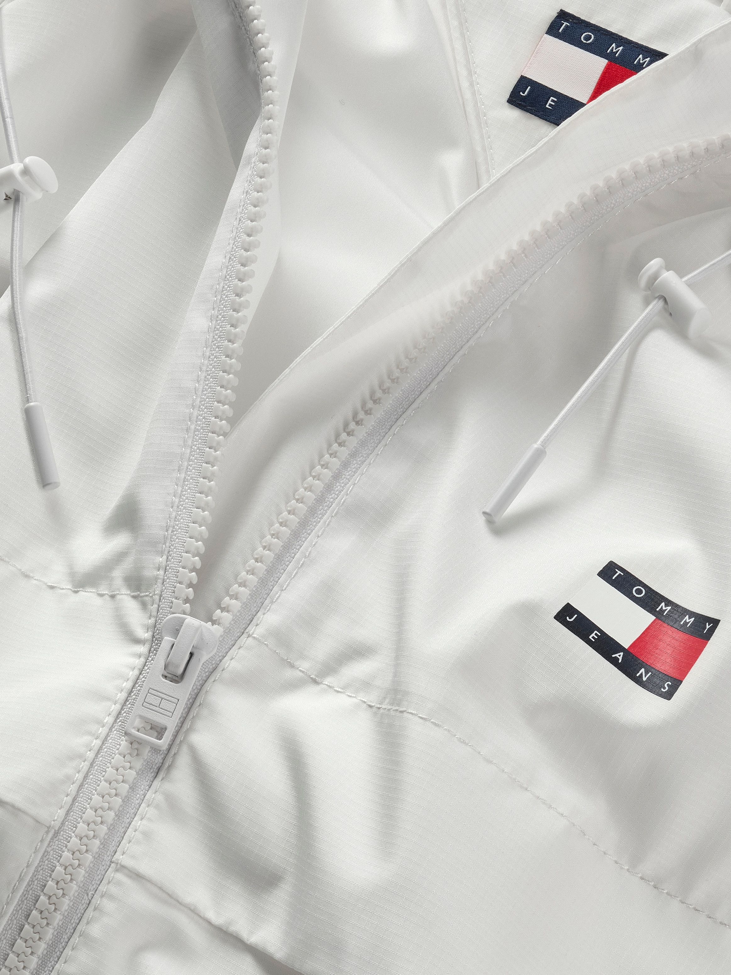 Tommy Jeans Windbreaker »TJW ESSENTIAL WINDBREAKER EXT«, mit Kapuze, mit Logodruck