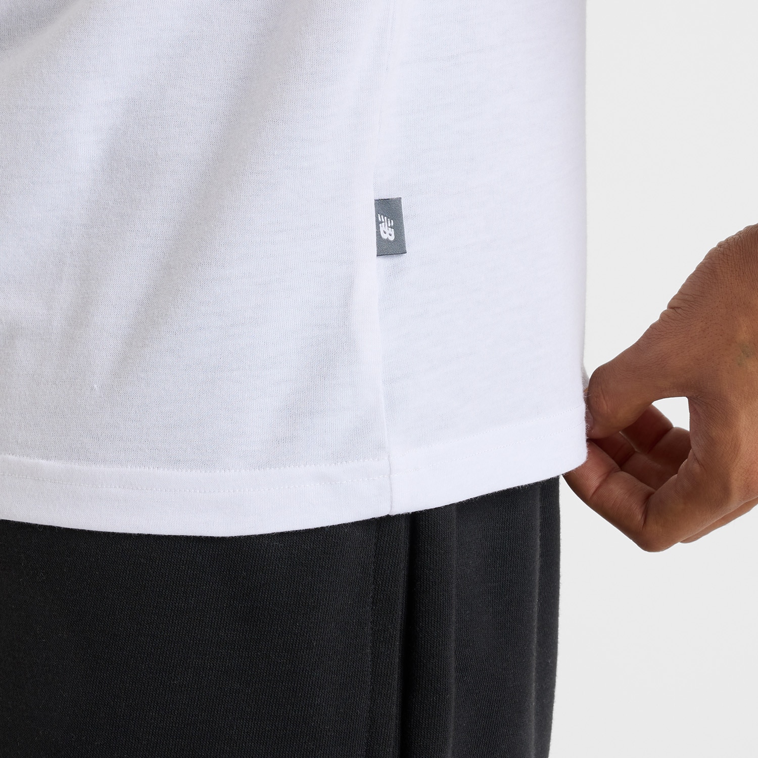New Balance Laufshirt »Heathertech Logo T-Shirt«