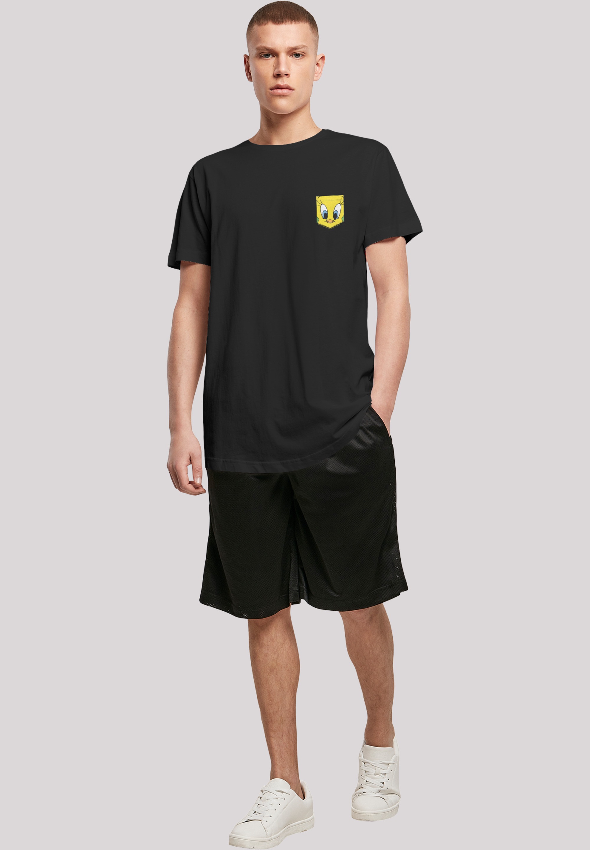 F4NT4STIC T-Shirt »Looney Tunes Tweety Pie Face Faux Pocket«, Print