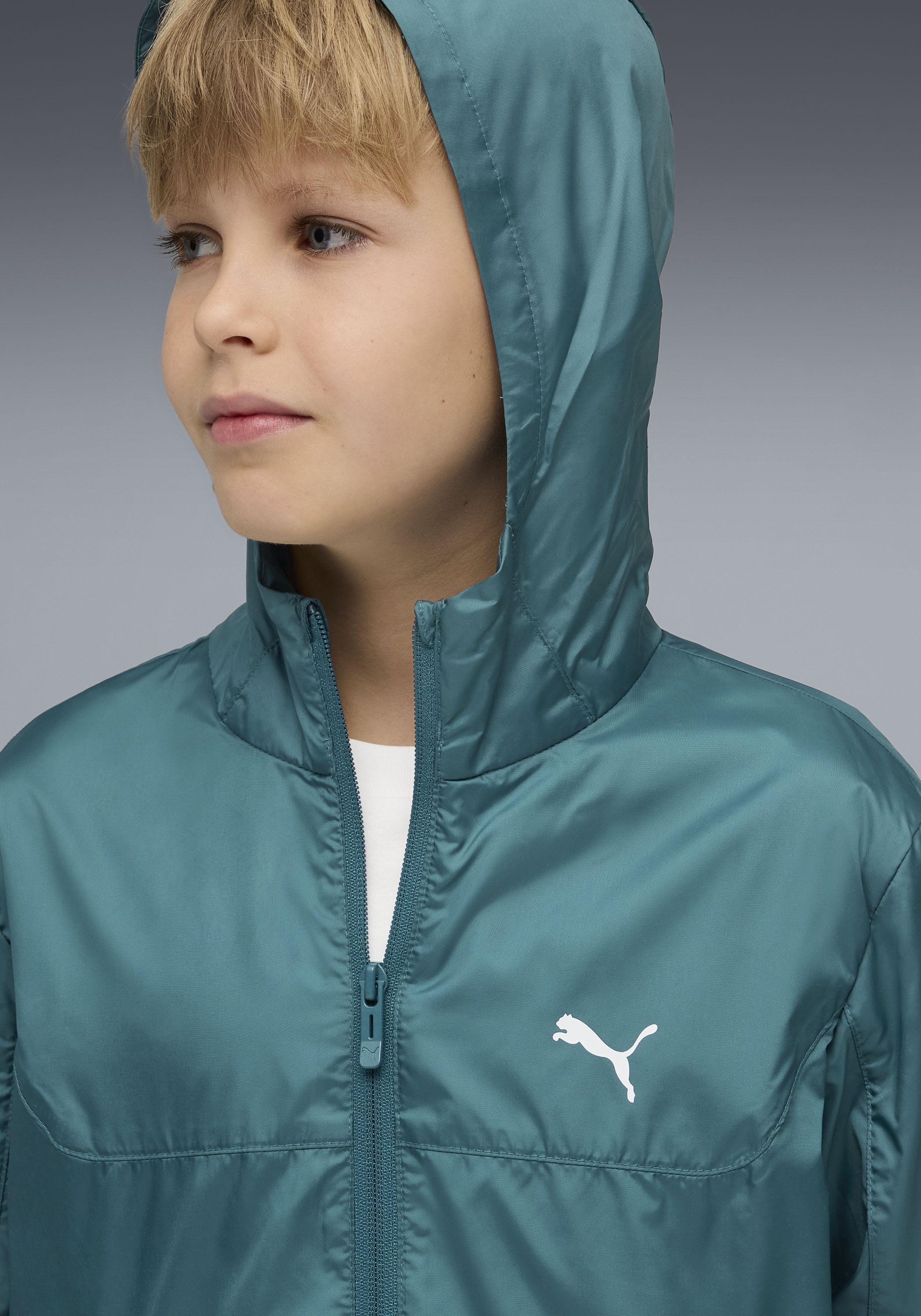 PUMA Windbreaker »ESS UV WINDBREAKER« mit Kapuze für Jugendliche, mit Kapuze, mit Eingrifftasche