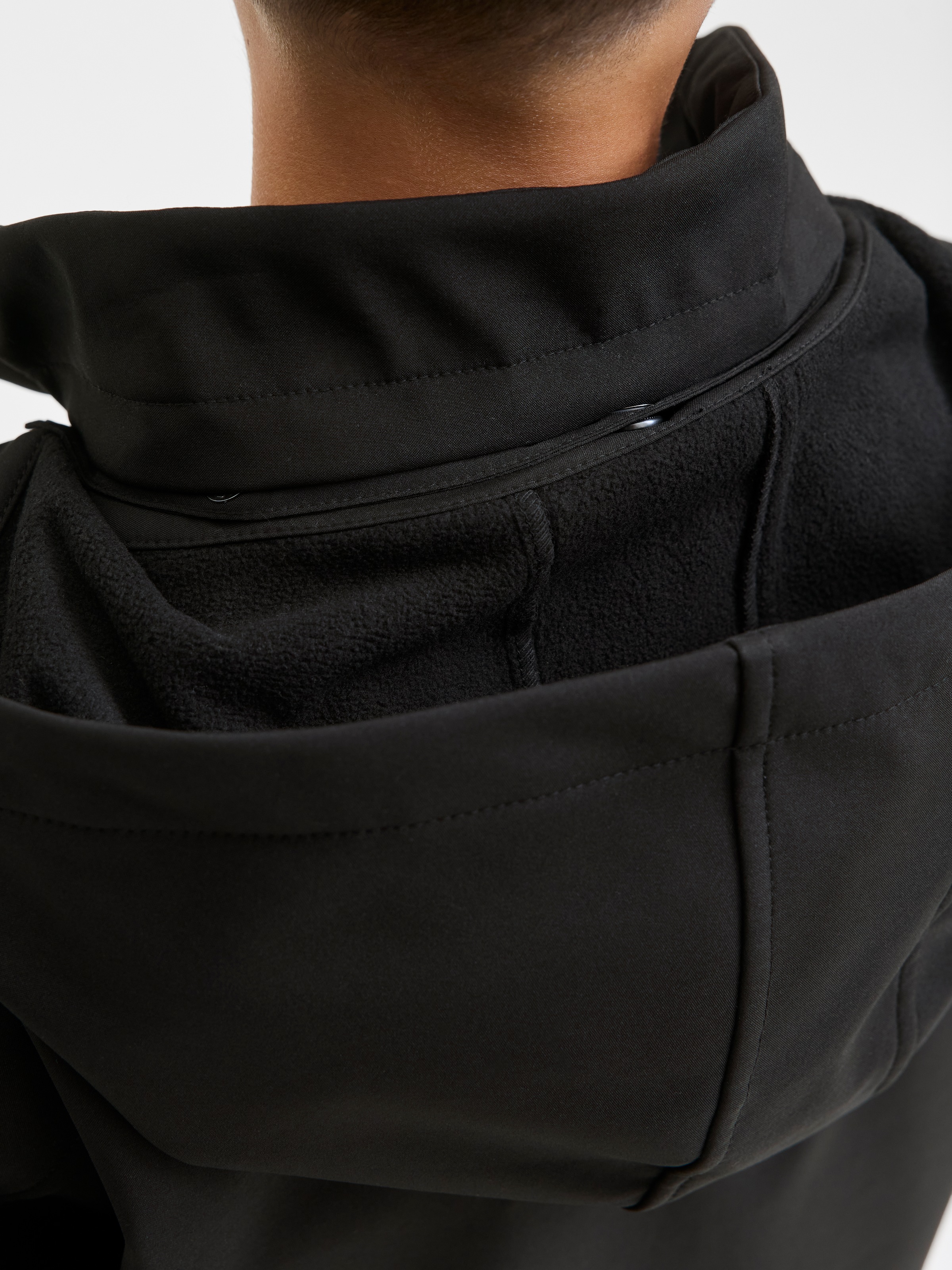 Thumbnail - Jack & Jones Junior Softshelljacke "JJEMATT SOFTSHELL HOOD SN JNR" mit Kapuze