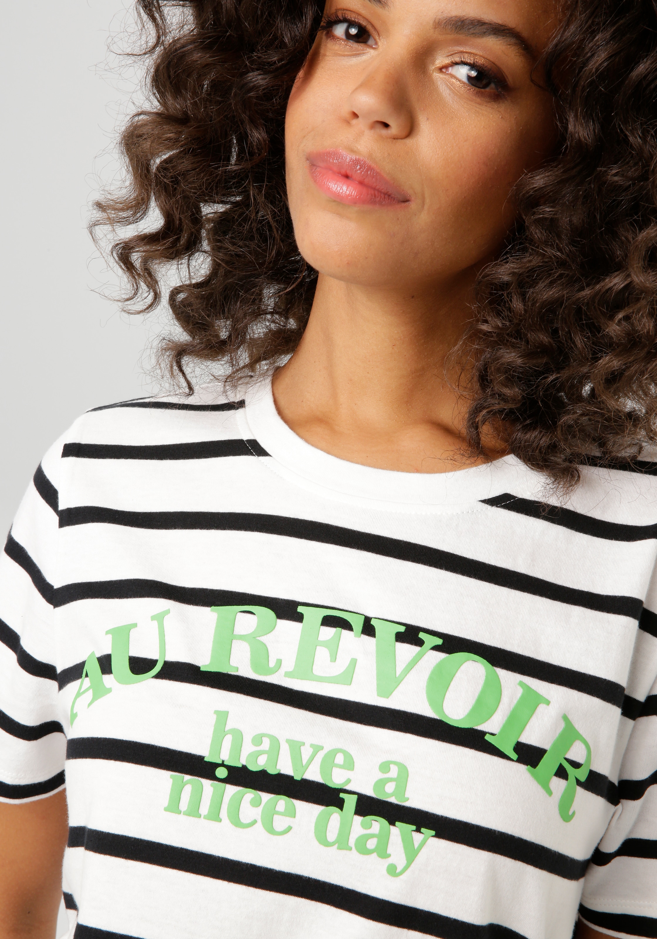 Aniston CASUAL T-Shirt, im Streifen-Dessin mit Statement-Schriftzug