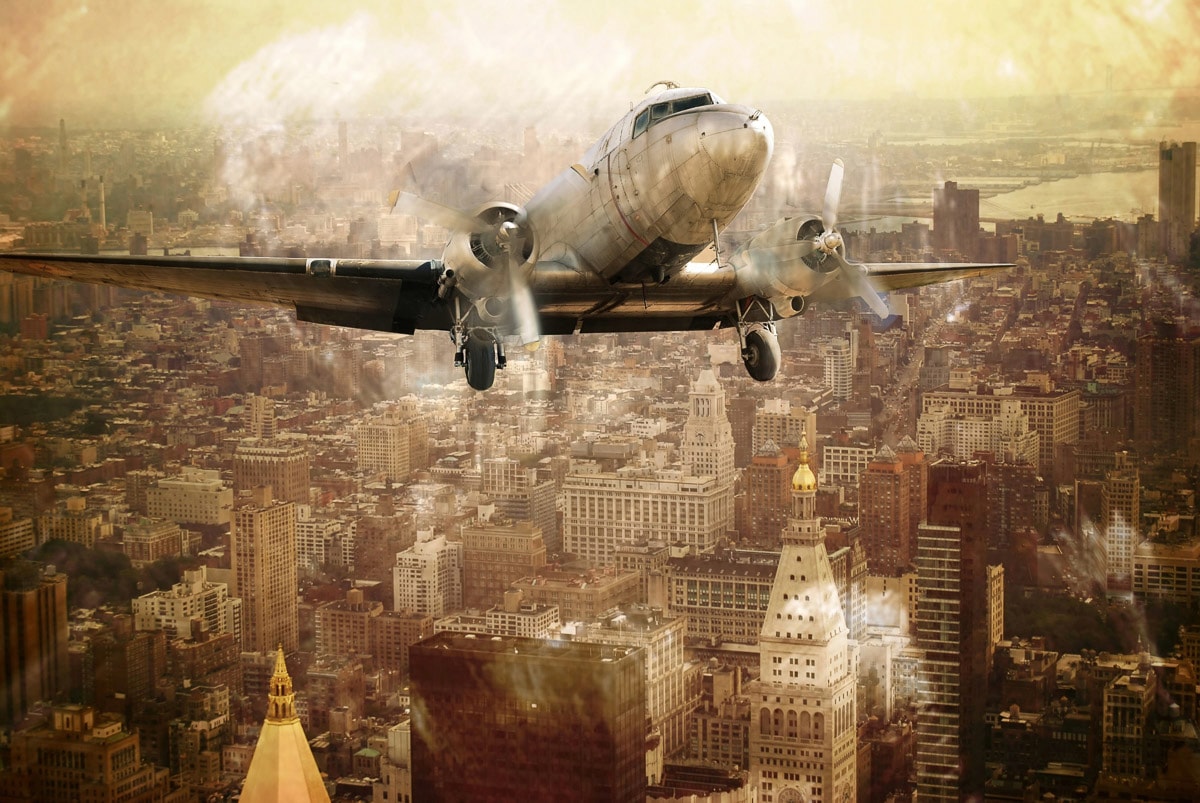 Papermoon Fototapete "Flugzeug über Stadt"
