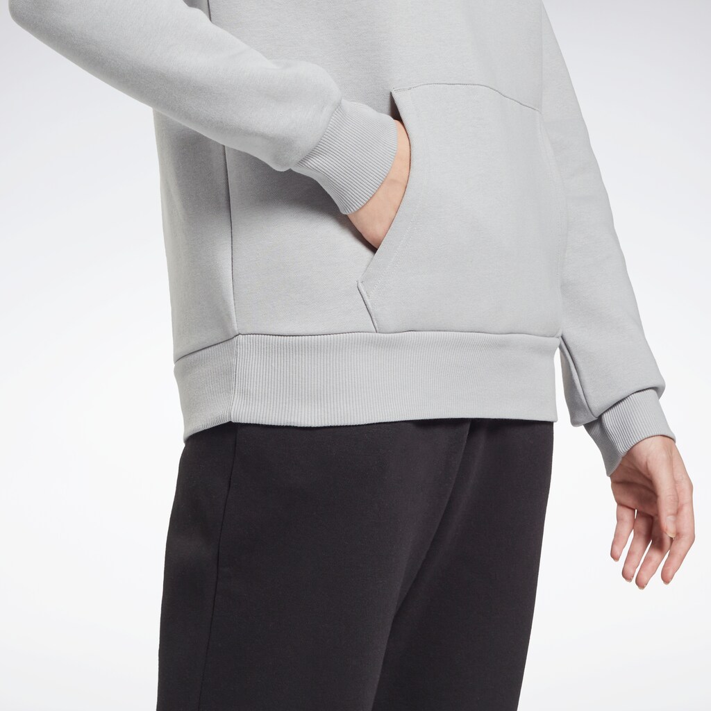 Damenmode Shirts & Sweatshirts Reebok Sweatshirt »TRAINING ESSENTIALS VECTOR HOODIE« grau