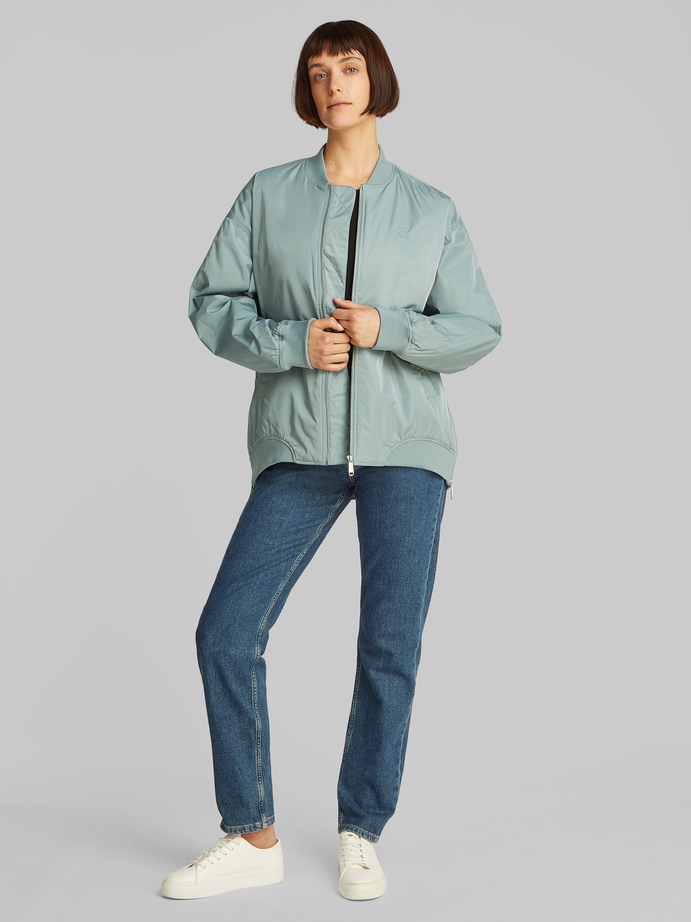 Calvin Klein Jeans Bomberjacke "LONG BOMBER" mit Logodruck, Rumpfabschluss günstig online kaufen