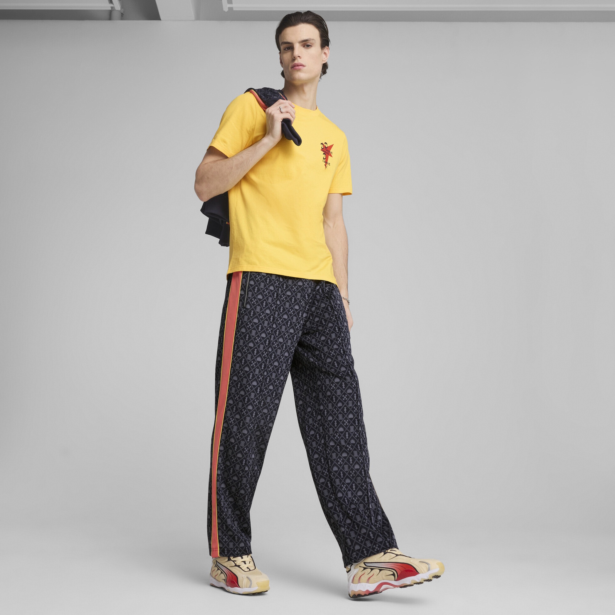 PUMA Sporthose »Road To Unity Graphic Relaxed Trainingshose Herren«