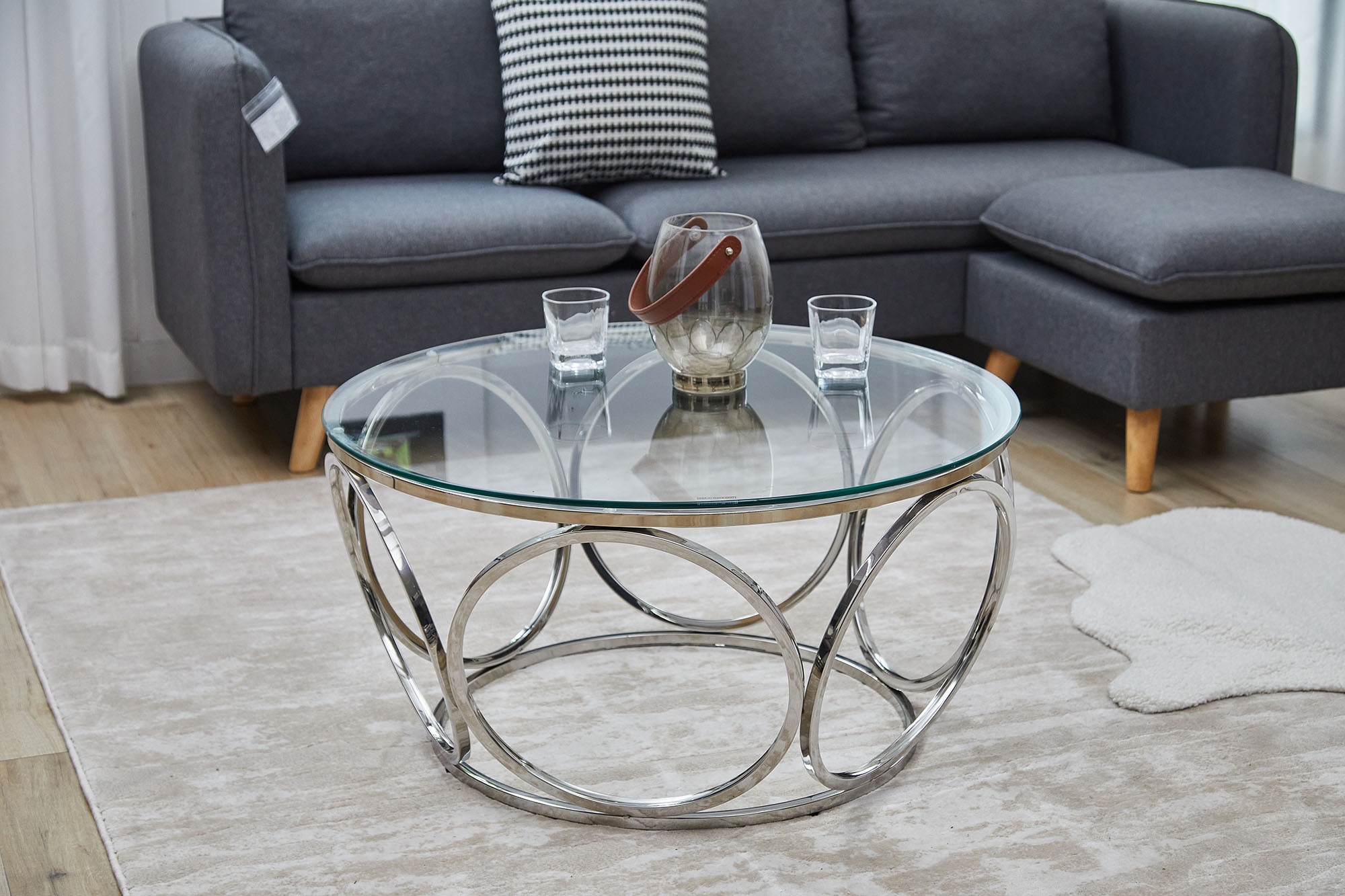 SalesFever Couchtisch, mit Design-Gestell aus Stainless Steel