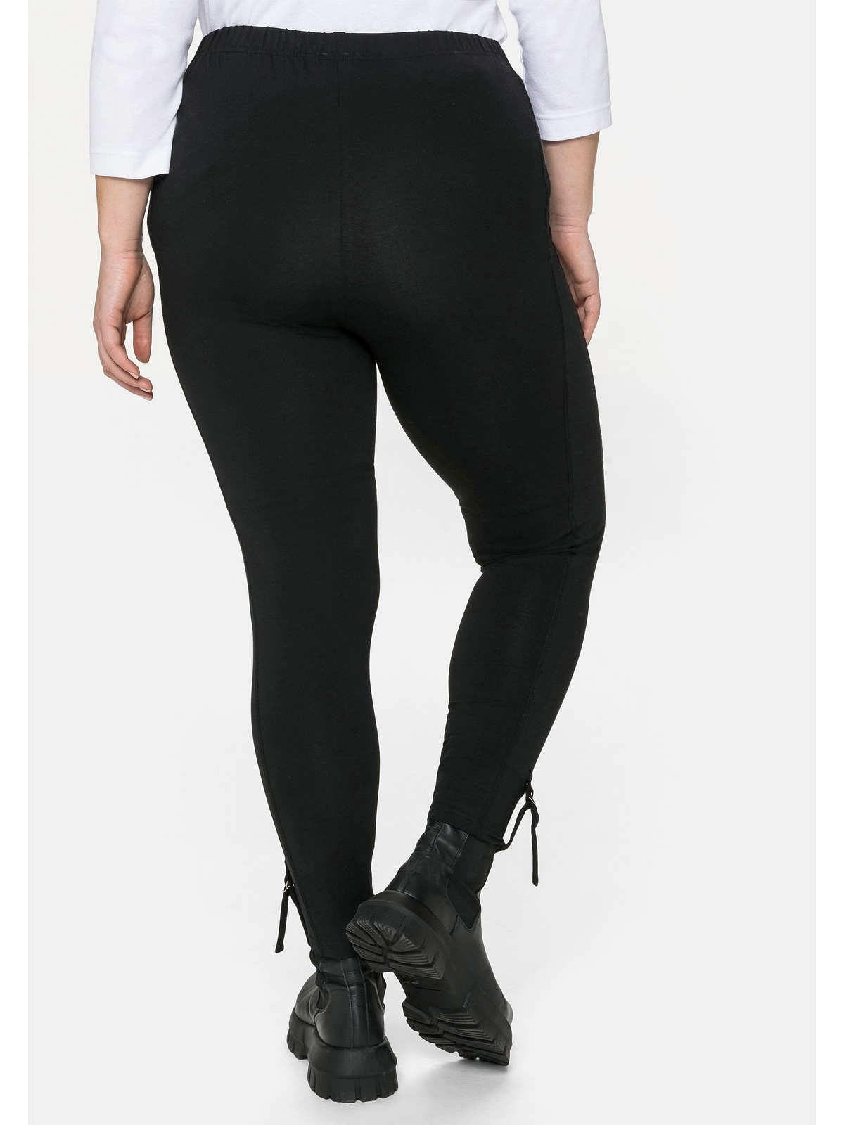 Sheego Leggings »7/8-Leggings«, in 7/8-Länge, mit Tasche und Lasche seitlich am Saum