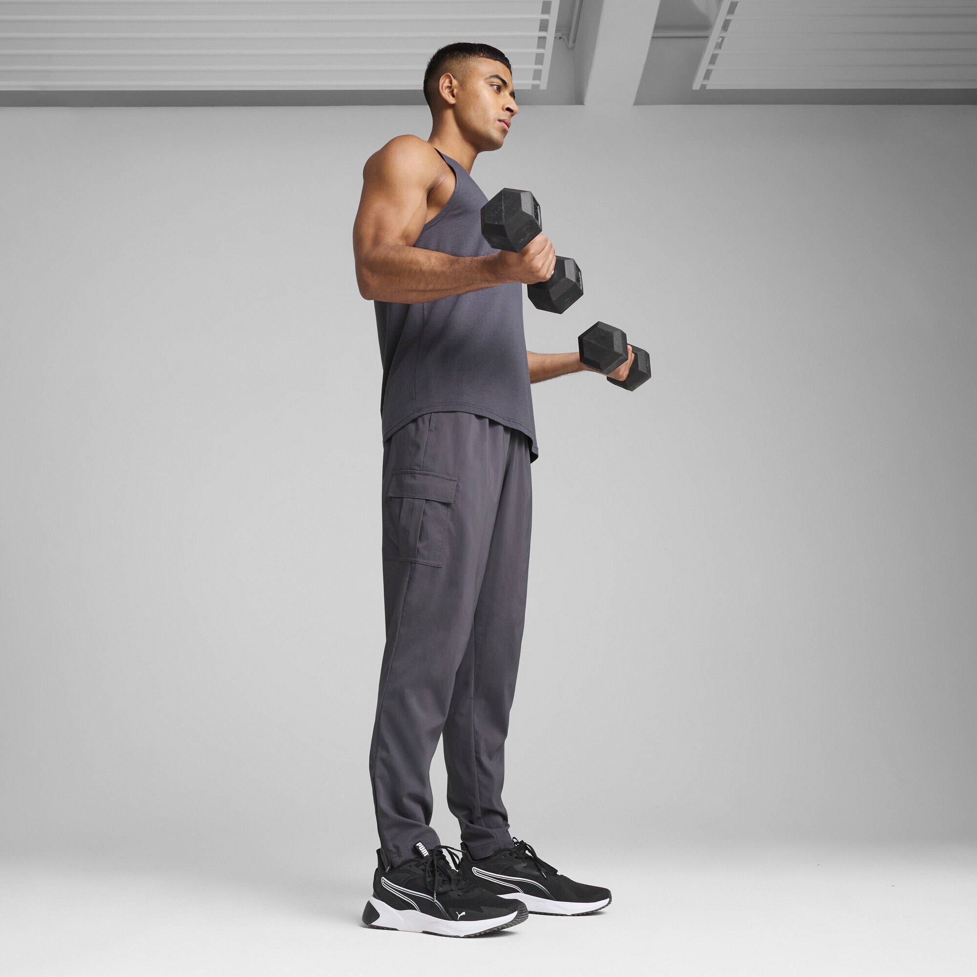 PUMA Trainingshose »TAD TECH Gewebte Cargohose Herren«