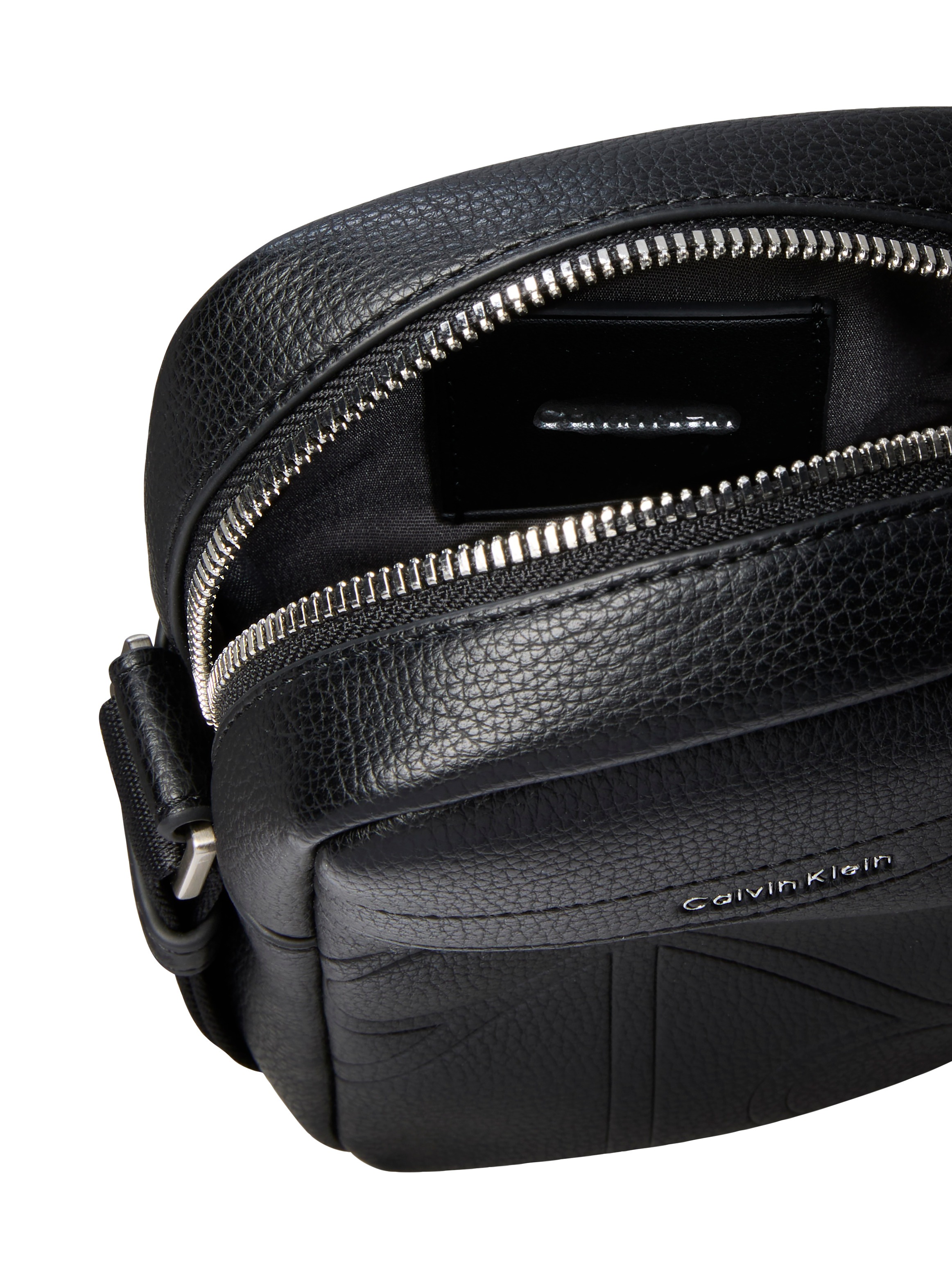 Calvin Klein Umhängetasche »EMBLEM AOP EMBOSS SLIM REPORTER« Schultertasche, Mini Bag mit CK-Logoschriftzug