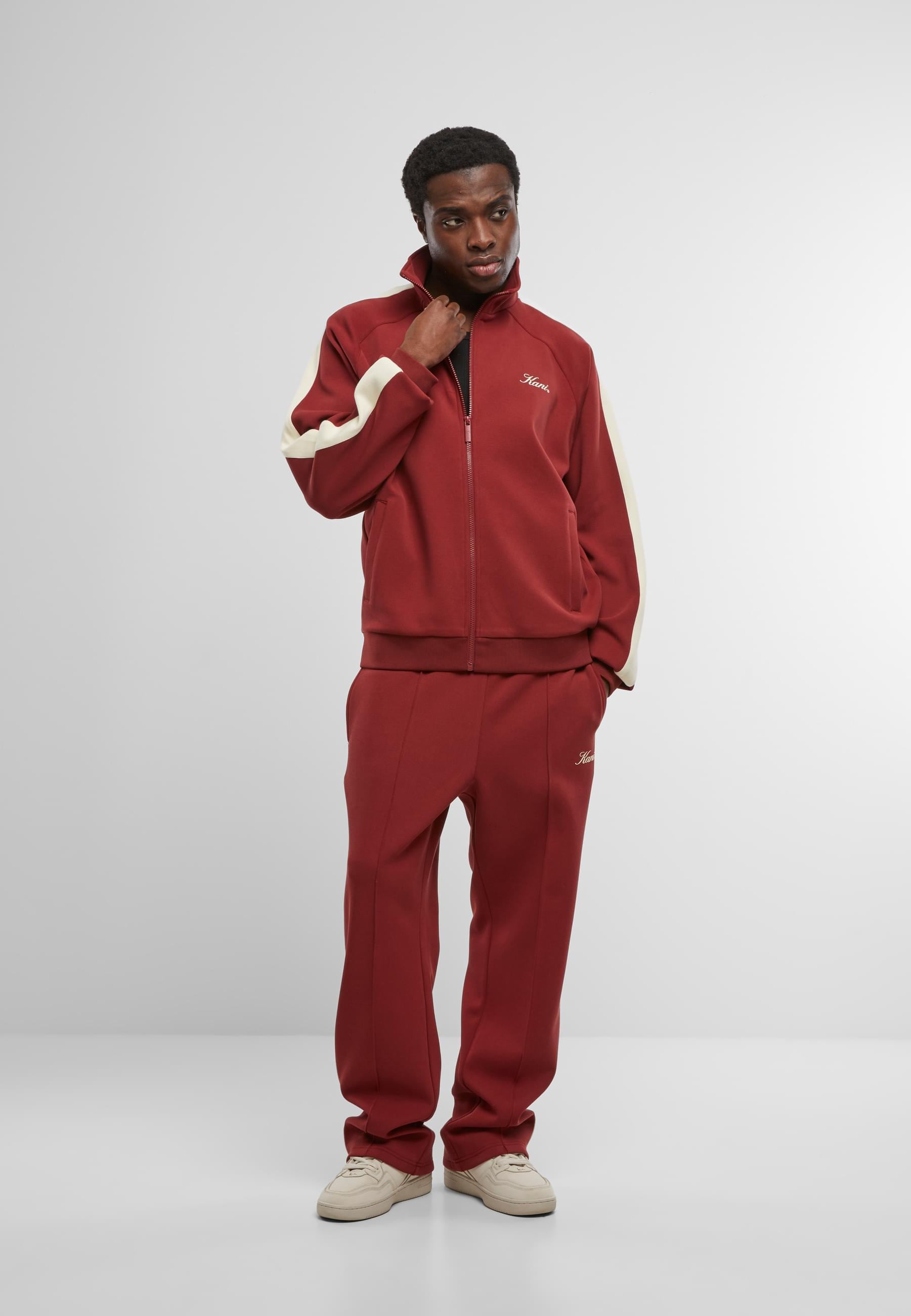 Karl Kani Trainingsjacke »Karl Kani Kani Sidestripe Trackjacket«, (1 St.), ohne Kapuze