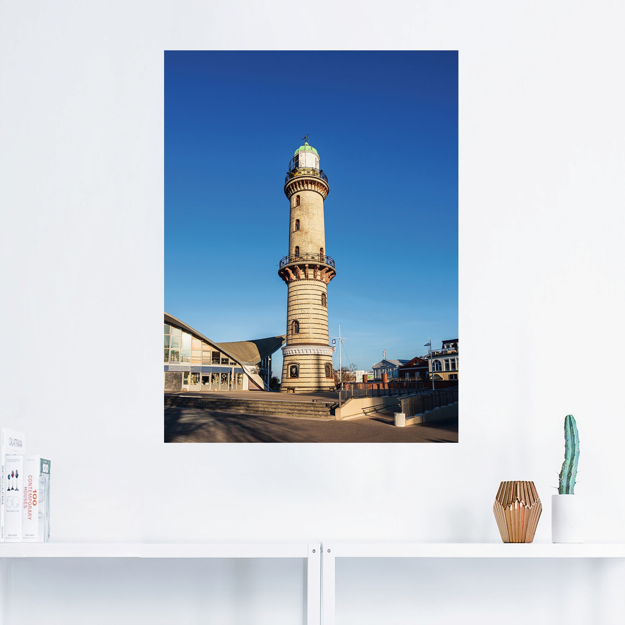 Artland Wandbild als | in St.), (1 versch. BAUR »Leuchtturm Größen Warnemünde«, Poster in Leinwandbild, mit bestellen Wandaufkleber Gebäude, Teepott oder Alubild