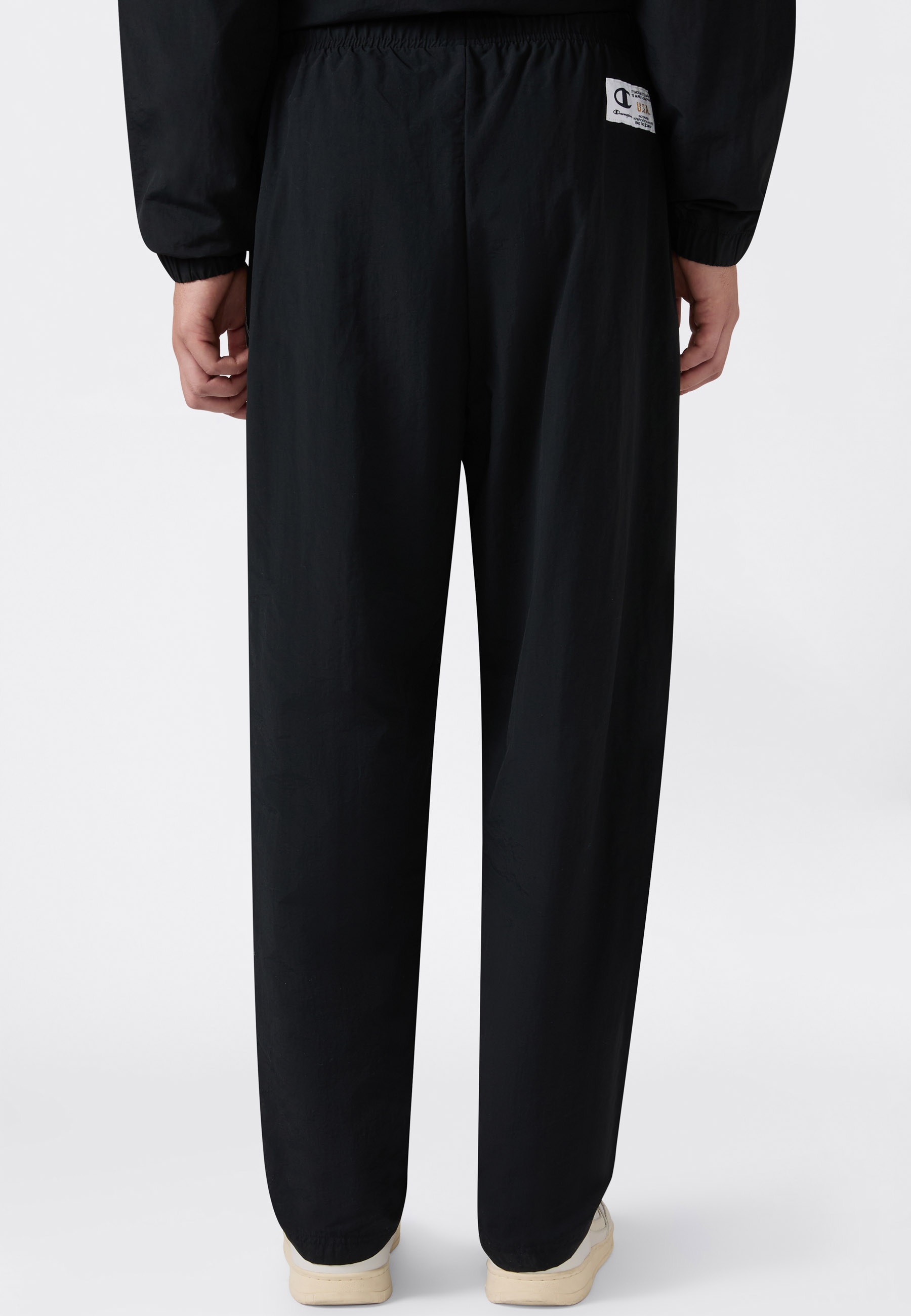 Champion Trainingshose »SPORTWEAR OPEN HEM PANTS Loose Fit Nylon«  mit sportlicher Optik, aus Polyamid