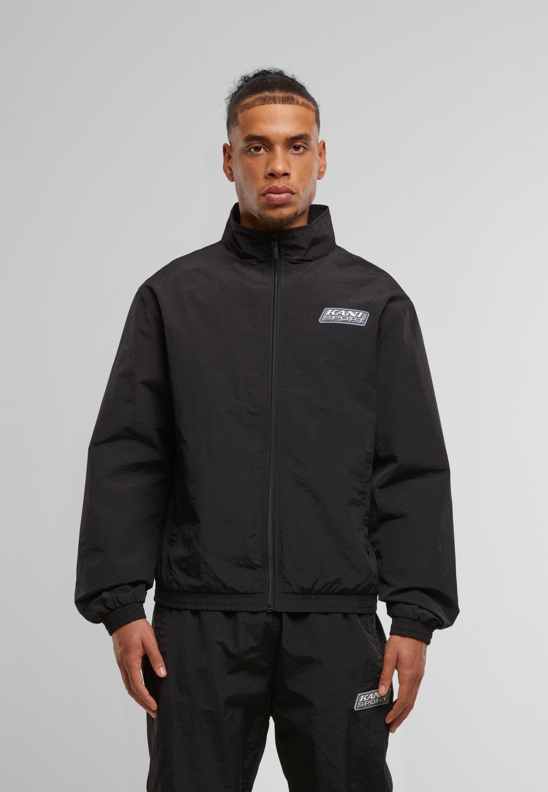 Karl Kani Trainingsjacke »Karl Kani Sport Patch Essential Trackjacket«, (1 St.), ohne Kapuze
