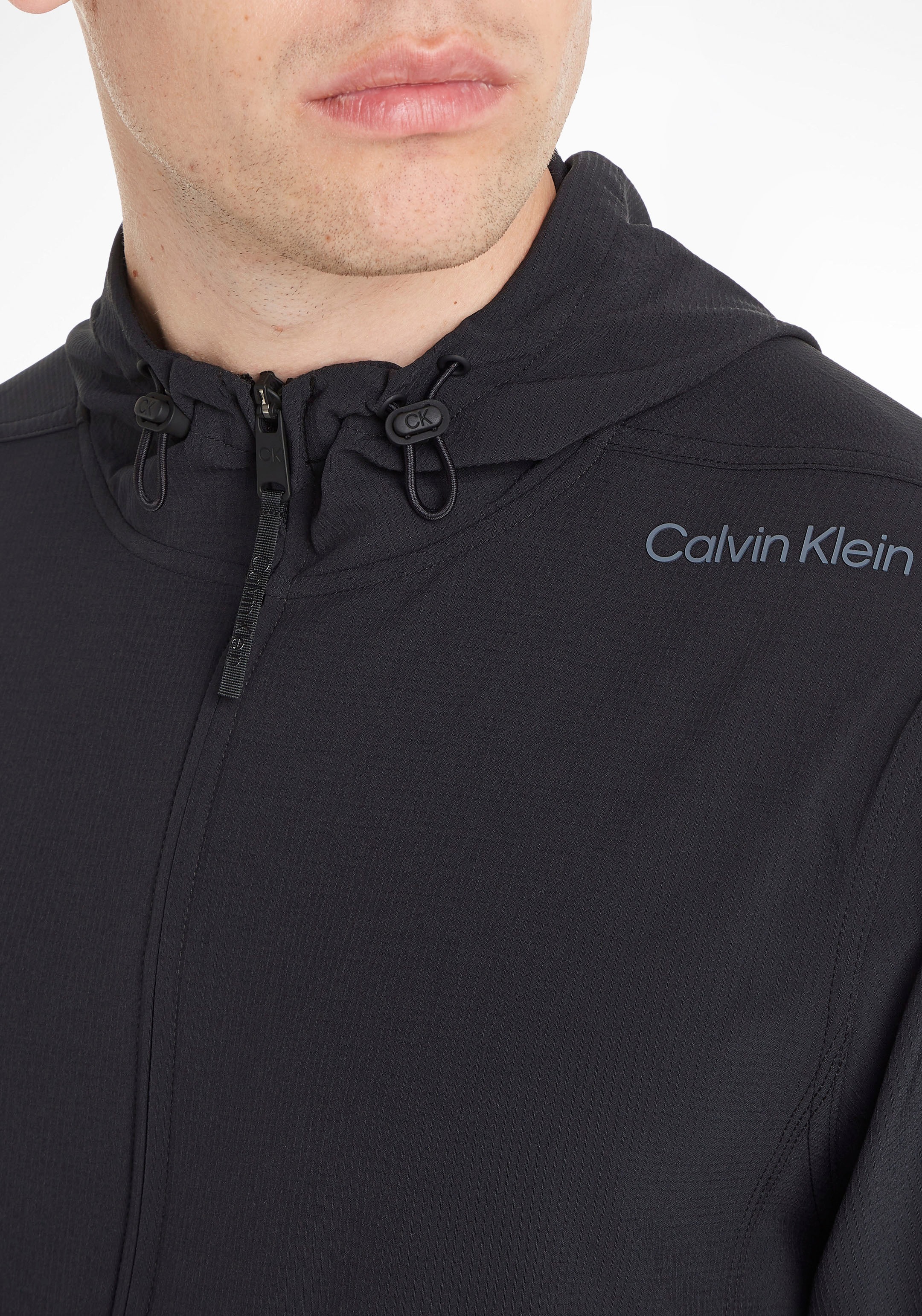 Thumbnail - Calvin Klein Sport Outdoorjacke mit Kapuze mit Kapuze und Eingrifftaschen