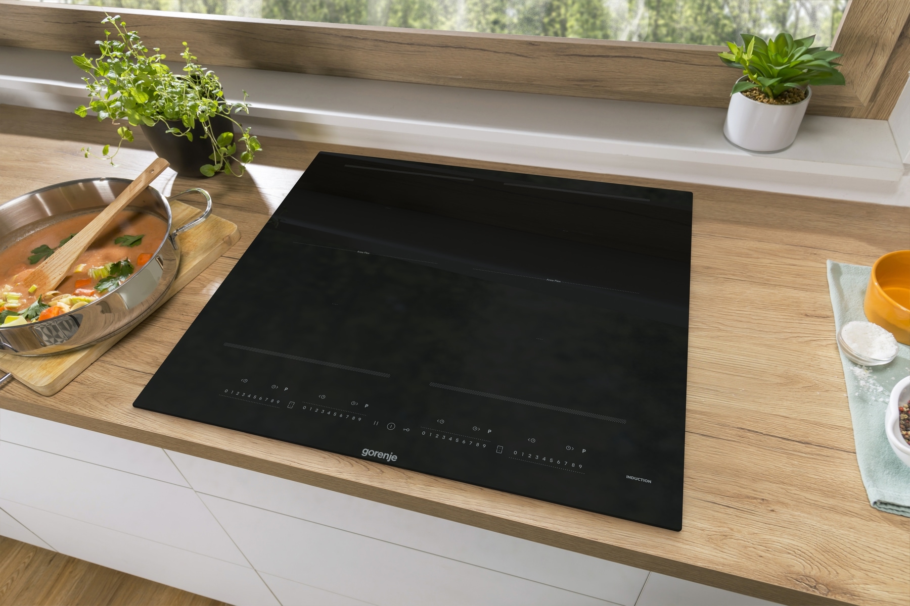 GORENJE Flex-Induktions-Kochfeld »GI 6442 BSCE«, AreaFlex verbindet Kochzonen für gleichmäßiges Garen in großen Töpfen.