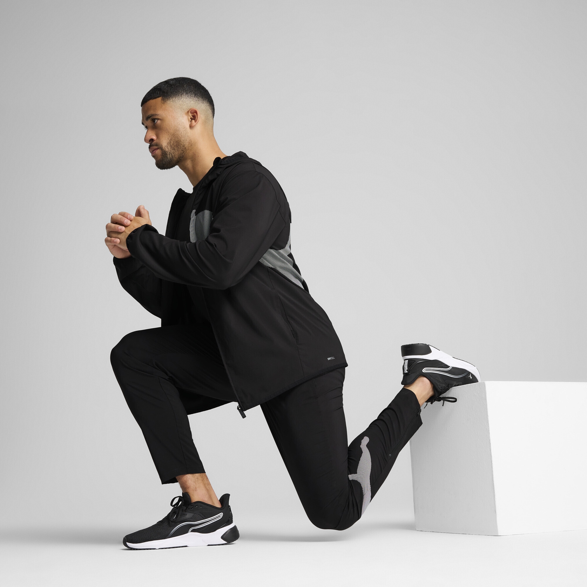 PUMA Trainingsjacke »Train All Day Big Logo Gewebte Jacke Herren«