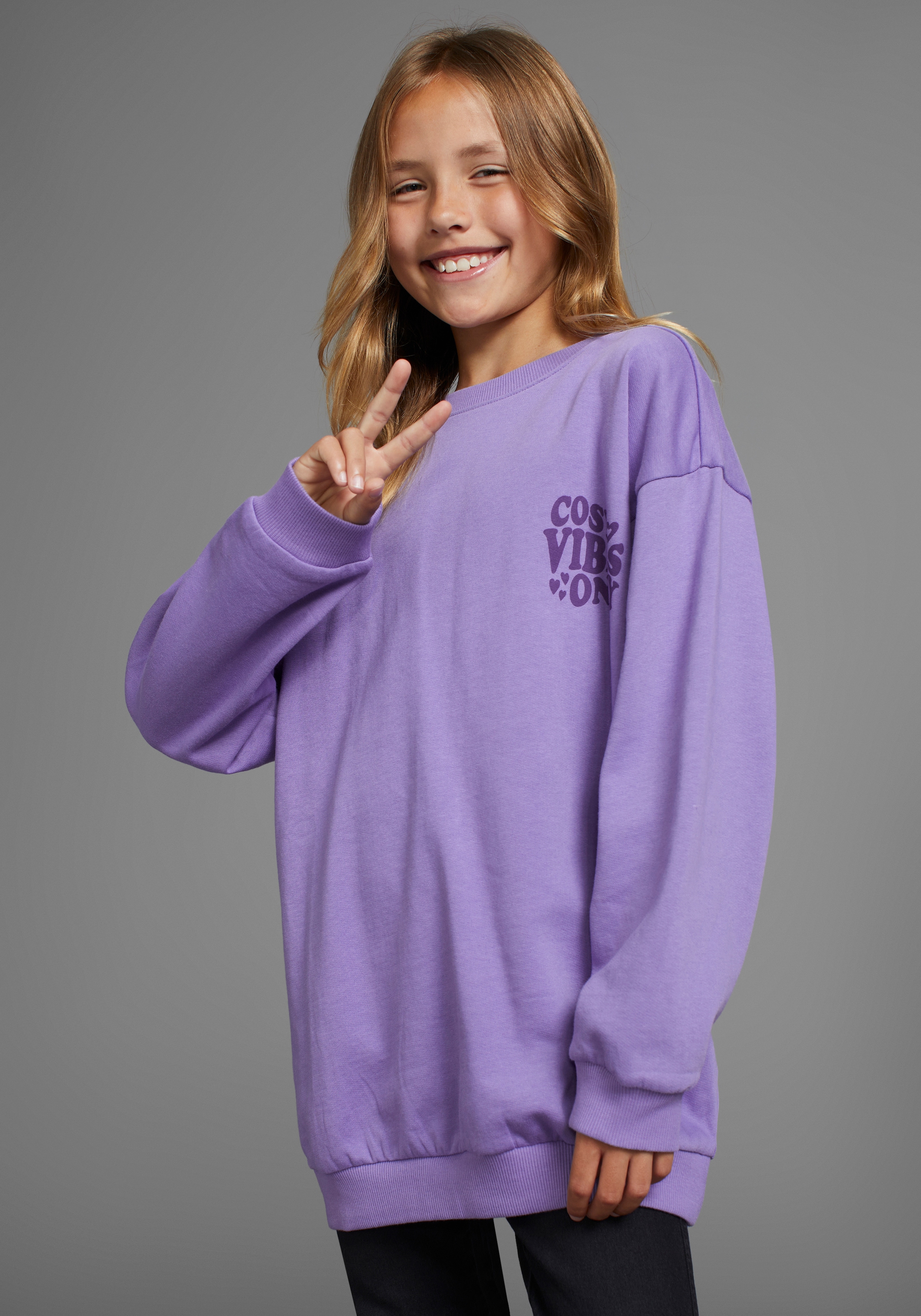 KIDSWORLD Sweatshirt "Rückenprint Sweatshirt in lockerer Form", Weites Sweatshirt mir Front- und Rückendruck in bequemer Form