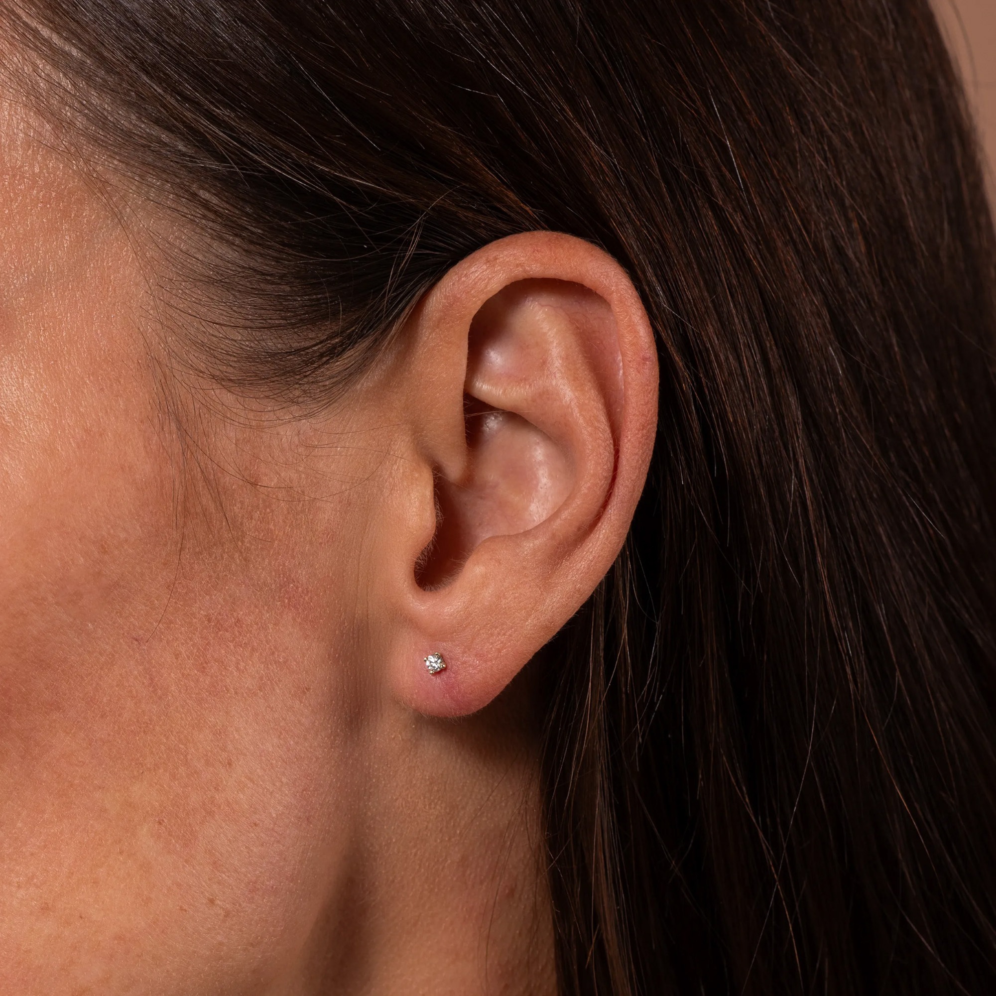 LYOMI Paar Ohrstecker »585/- Gelbgold 2 synth. Diam. 0,10 ct.«