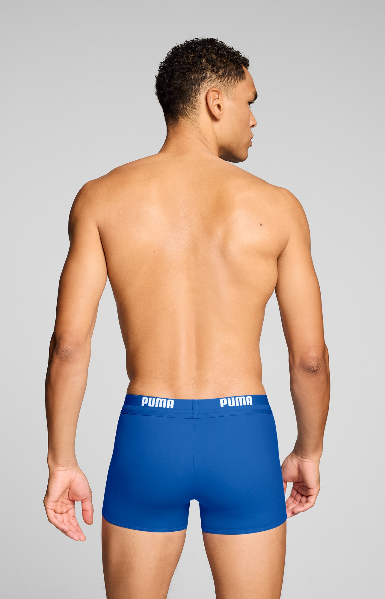 PUMA Badehose »PUMA SWIM MEN LOGO TRUNKS« elastischer Logobund mit integriertem Kordelzug