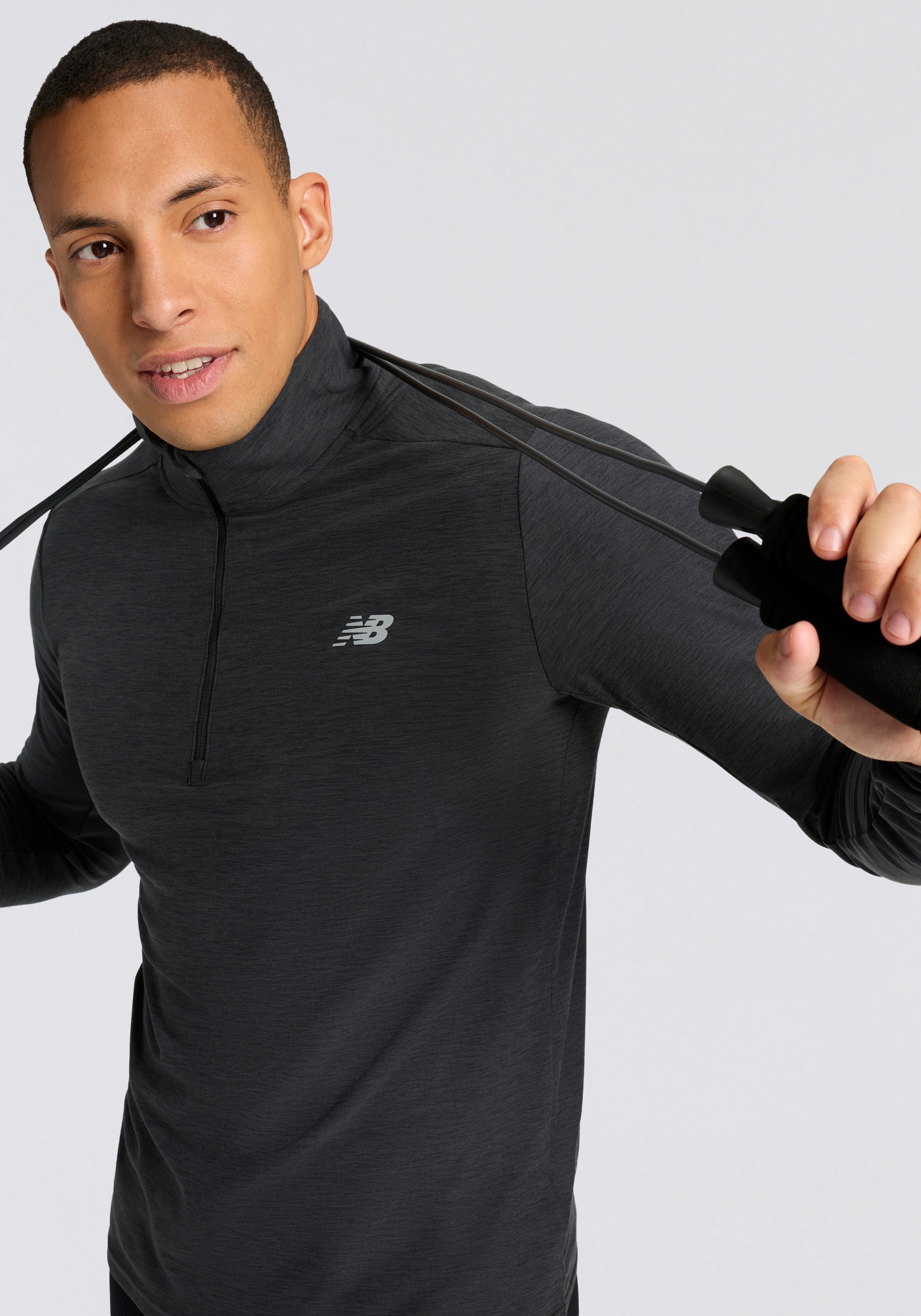 Thumbnail - New Balance Laufshirt "Space Dye 1/4 Zip" mit Label