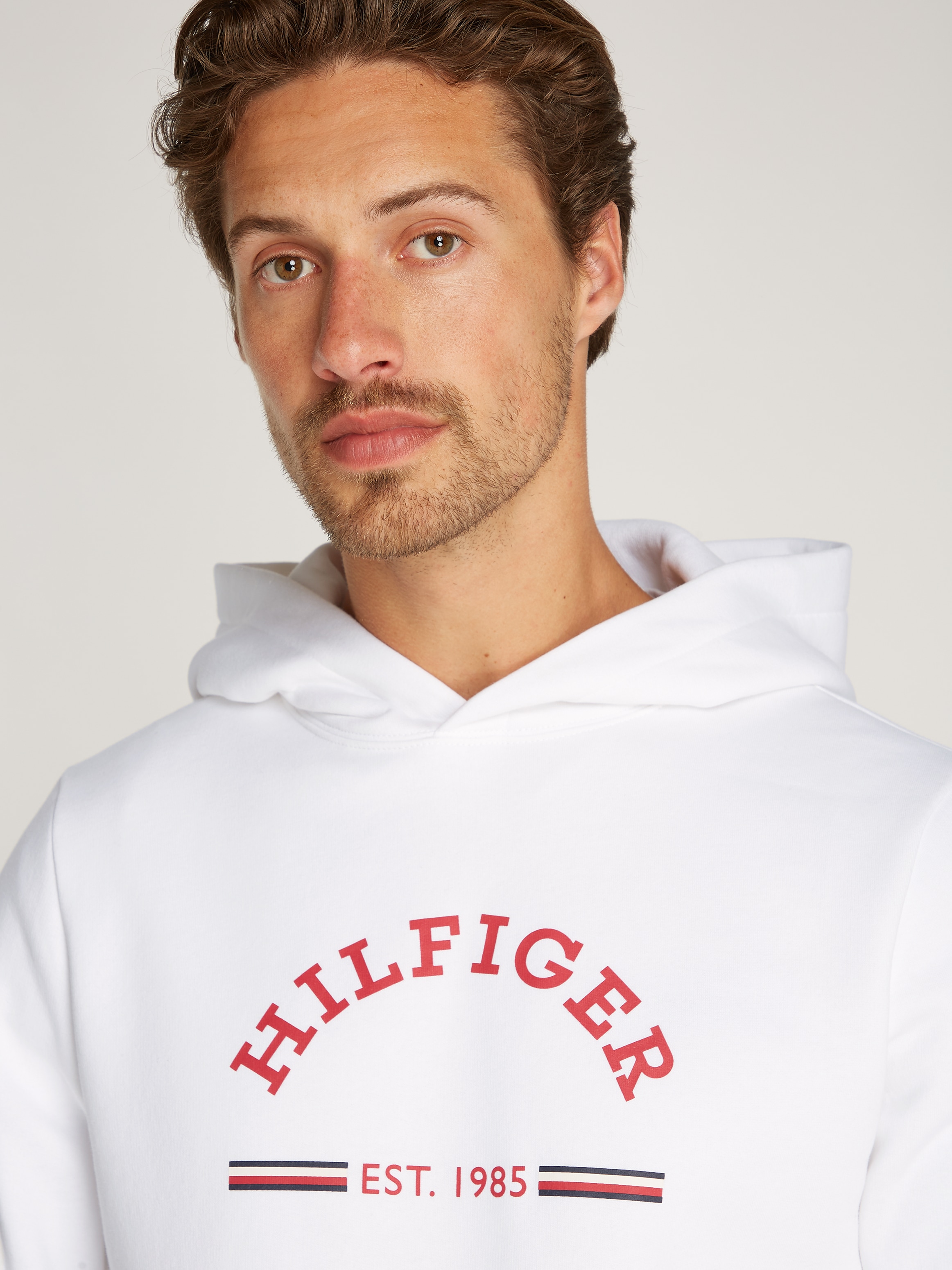 Tommy Hilfiger Kapuzensweatshirt »ROUNDALL HOODY«, kontrastfarbener Markenprint