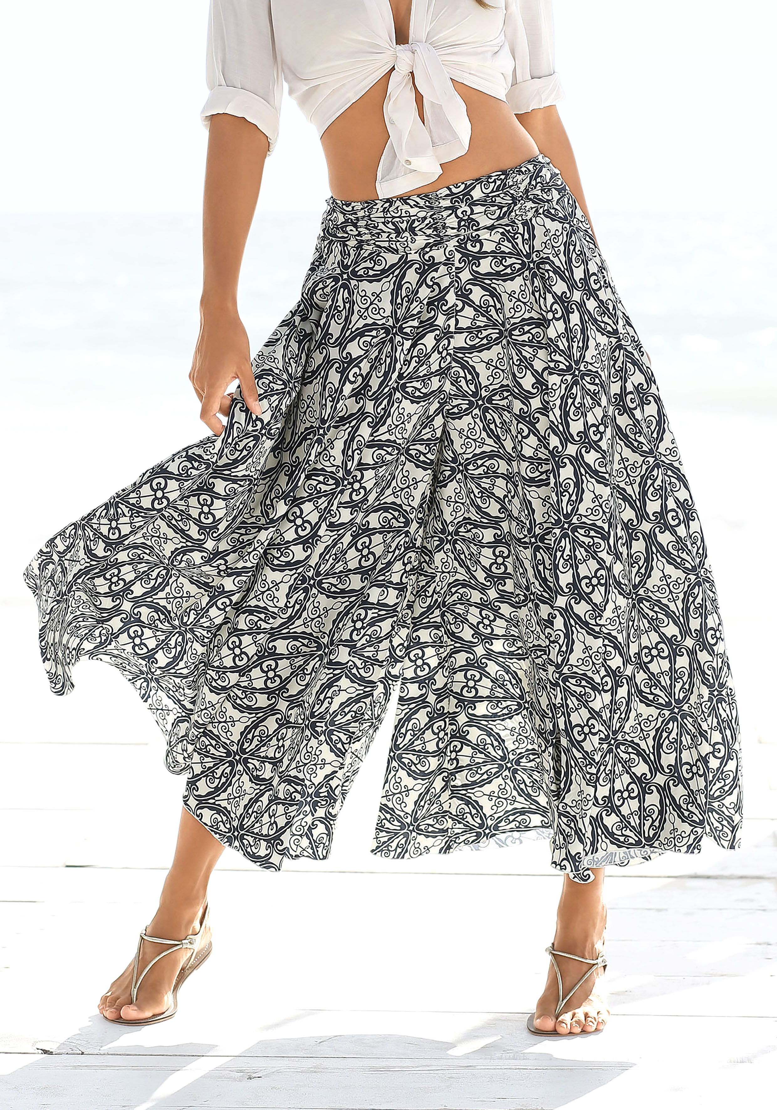 LASCANA Hosenrock "mit weitem Bein" Alloverdruck, Culotte, weites Bein, luftige Sommerhose, Schlupfhose