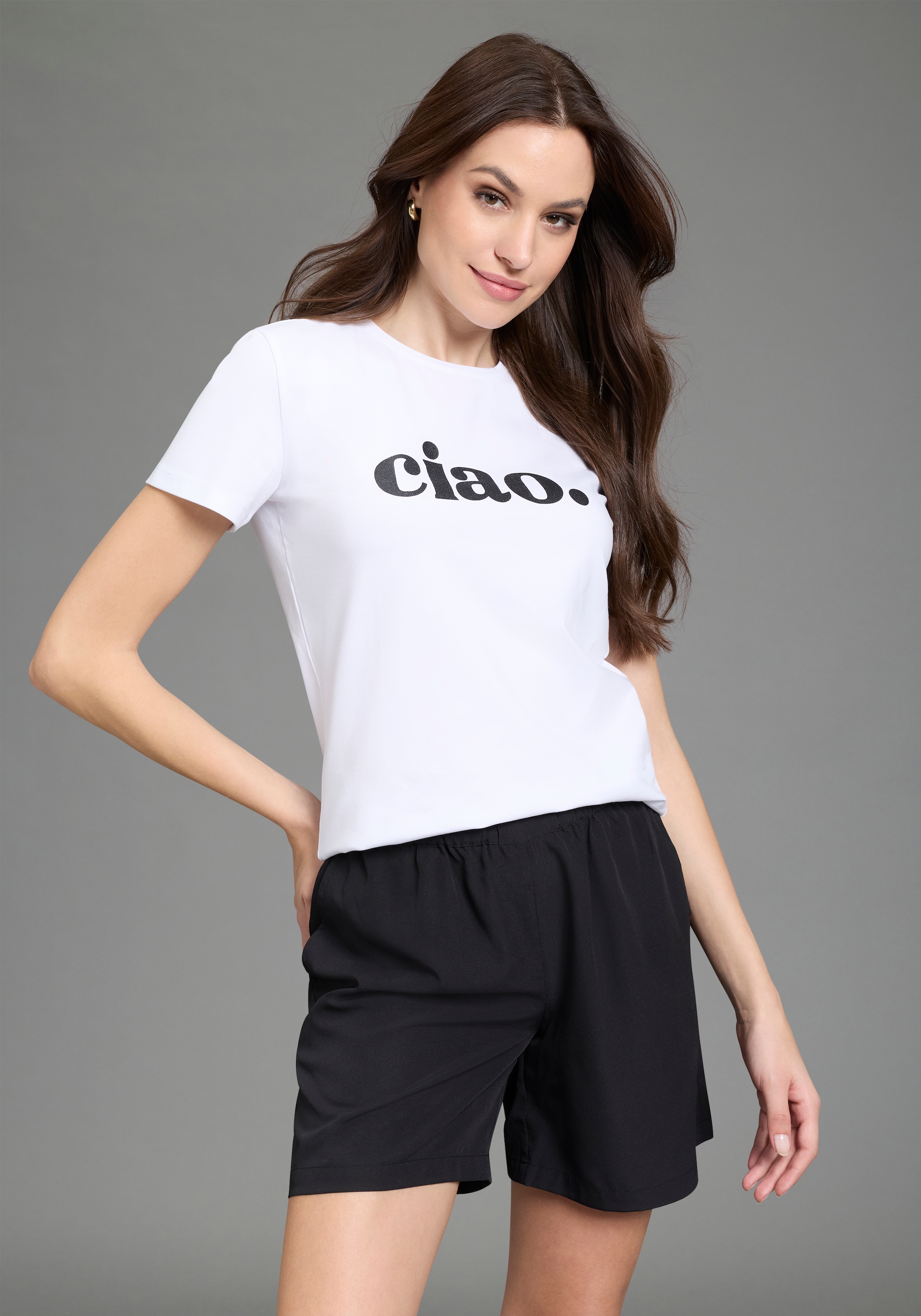 Laura Scott T-Shirt "ciao" mit glitzerndem Statement-Print, figurumspielend günstig online kaufen