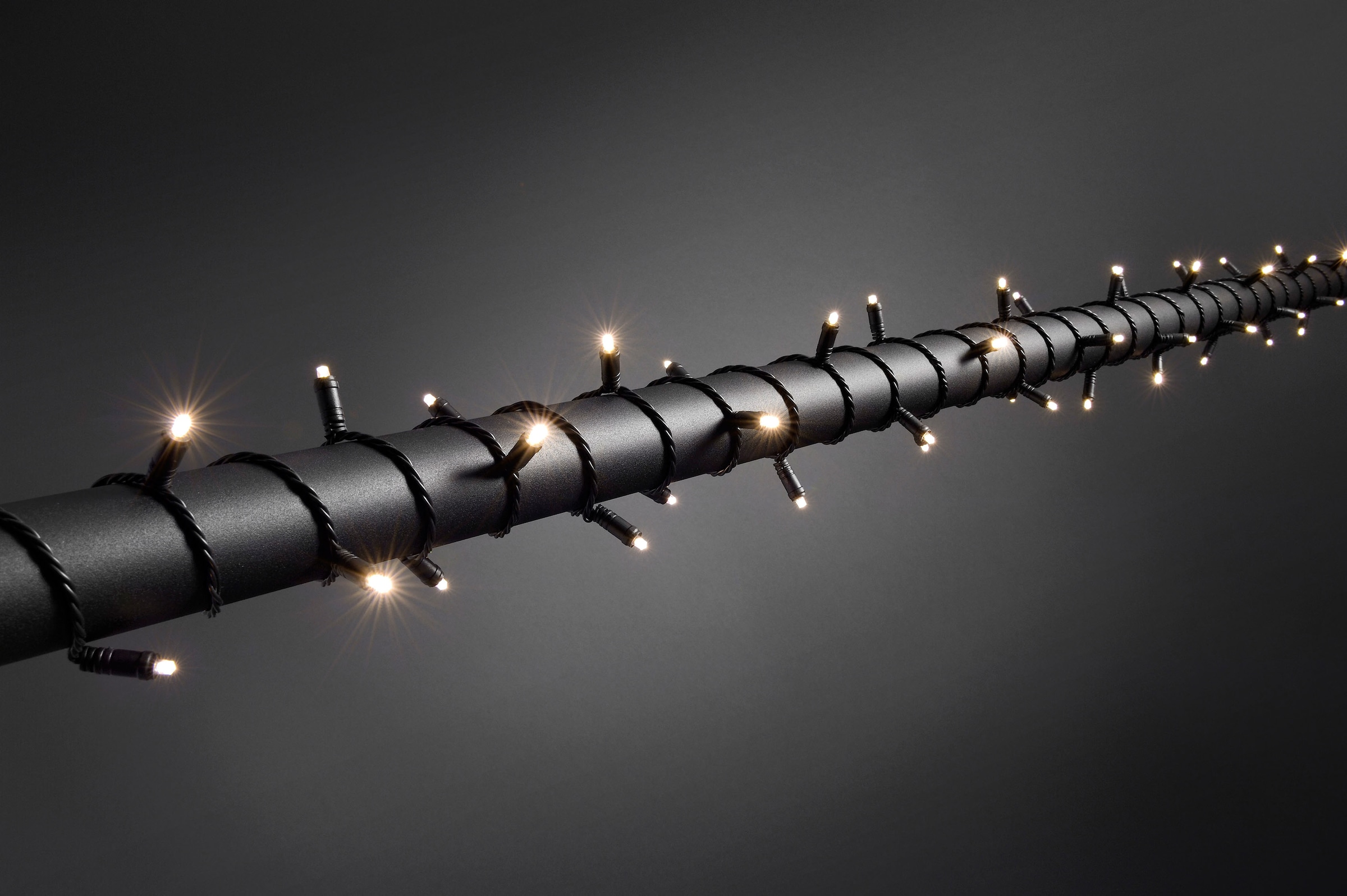 KONSTSMIDE LED-Lichterkette, schwarz, Dioden 120 Stk. Flammen 120 Stk., Kabellänge 10m x Gesamtlänge 21,9m, Lichterketten, Micro LEDs, schutzisoliert/umgossen, 120 warm weiße Dioden