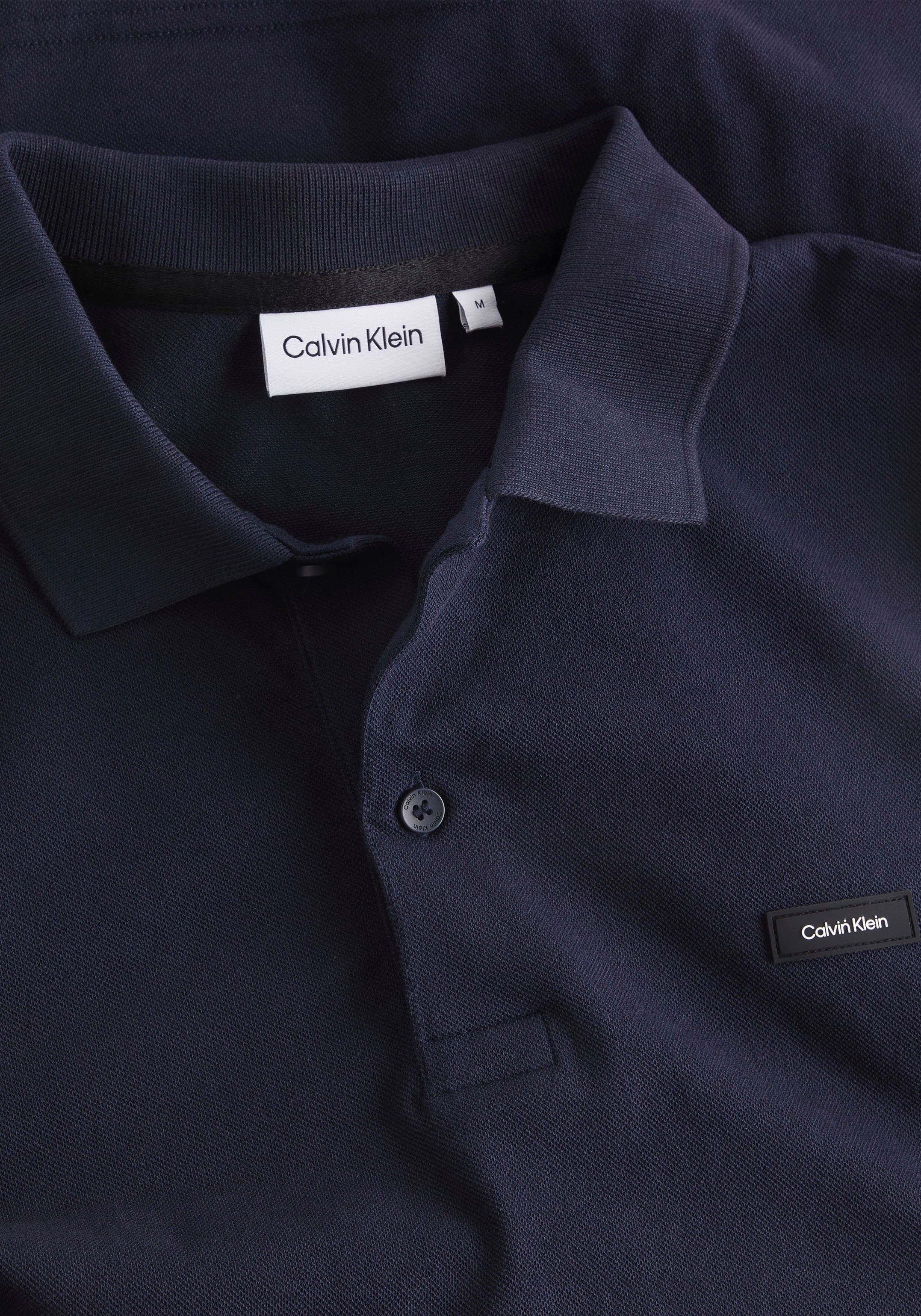 Calvin Klein Poloshirt, mit Calvin Klein Logo auf der Brust