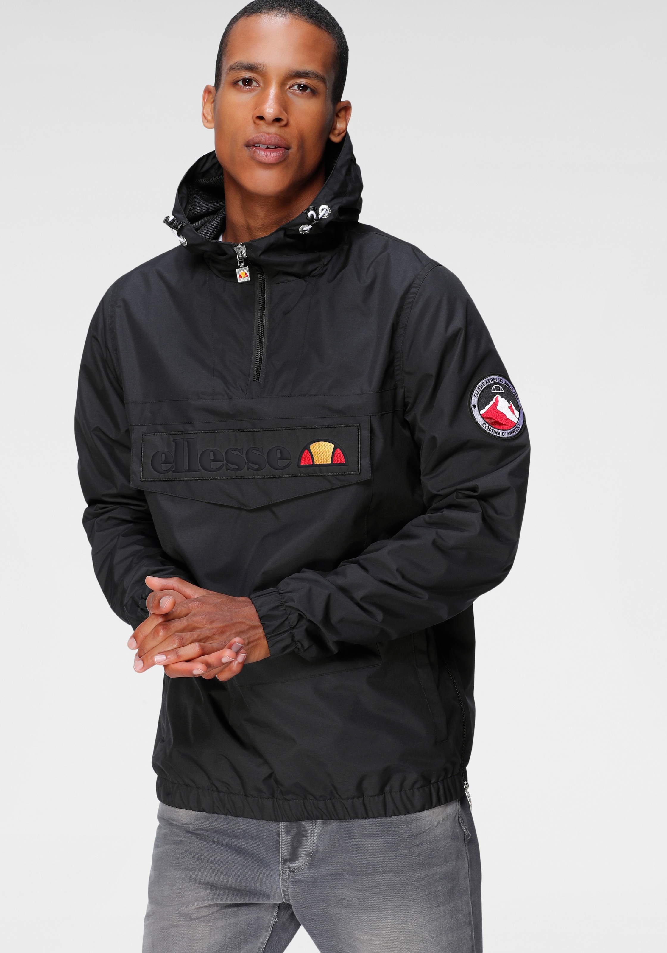 Ellesse Windbreaker "MONT 2 JACKET" mit Kapuze mit Kapuze, Reißverschluss, Fronttasche und elastischen Abschlüssen