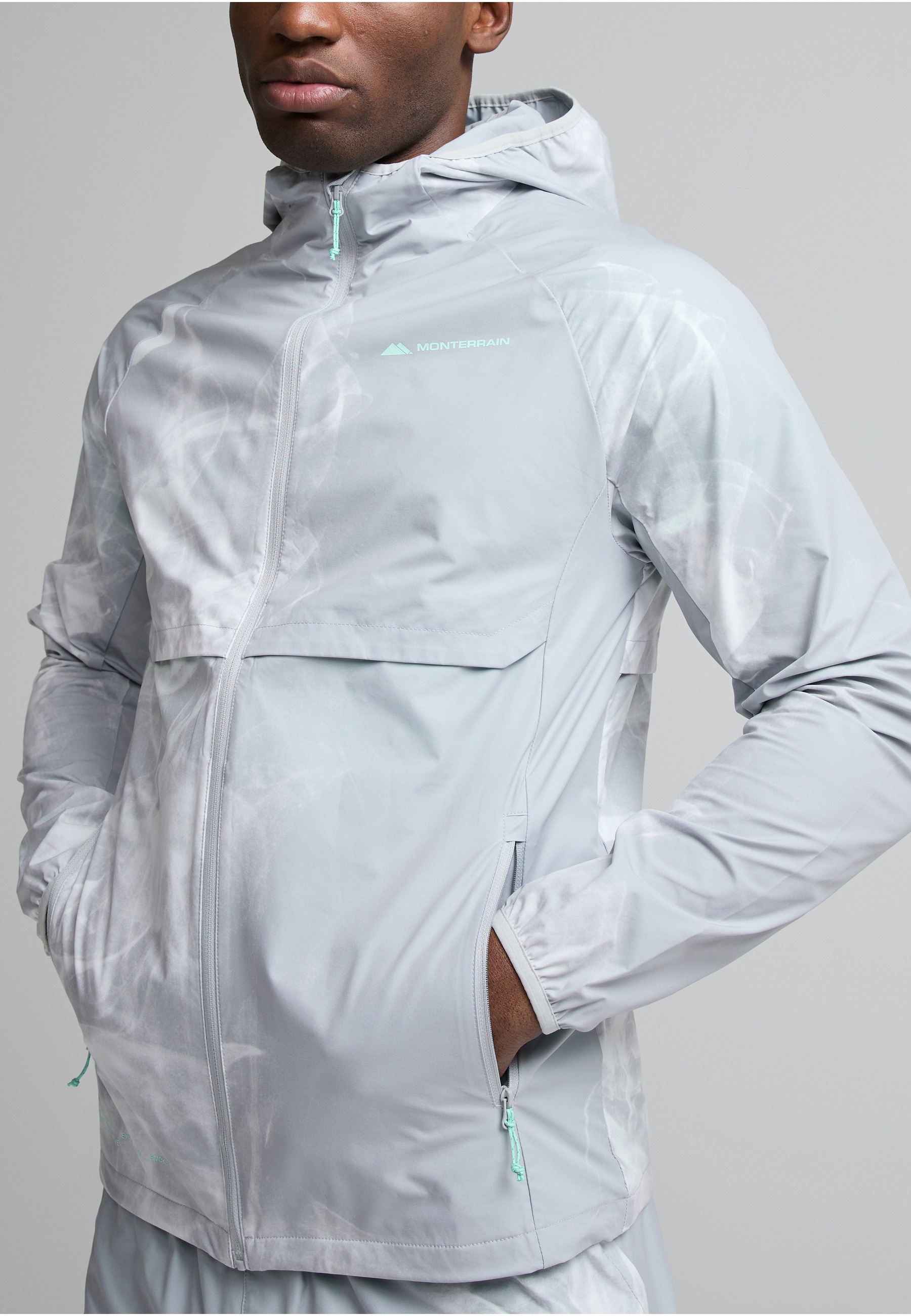 Monterrain Outdoorjacke »Monterrain TRANSCEND WINDRUNNER« 1 Stk. tlg. mit Kapuze