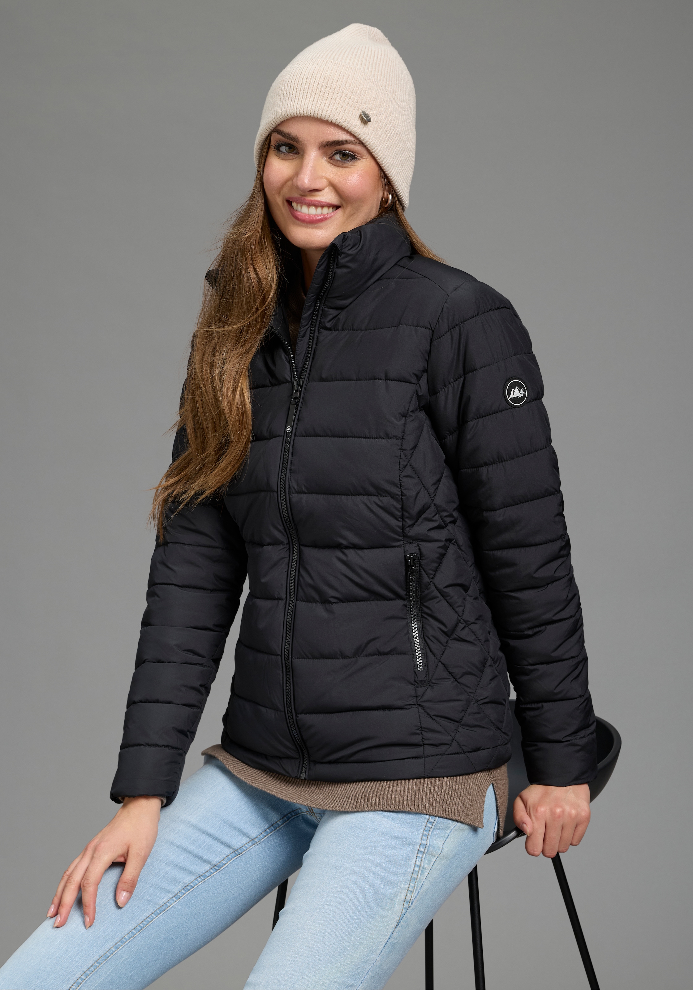 Polarino Steppjacke hüftlang geschnitten, wärmeisolierend, winddicht, mit Stehkragen