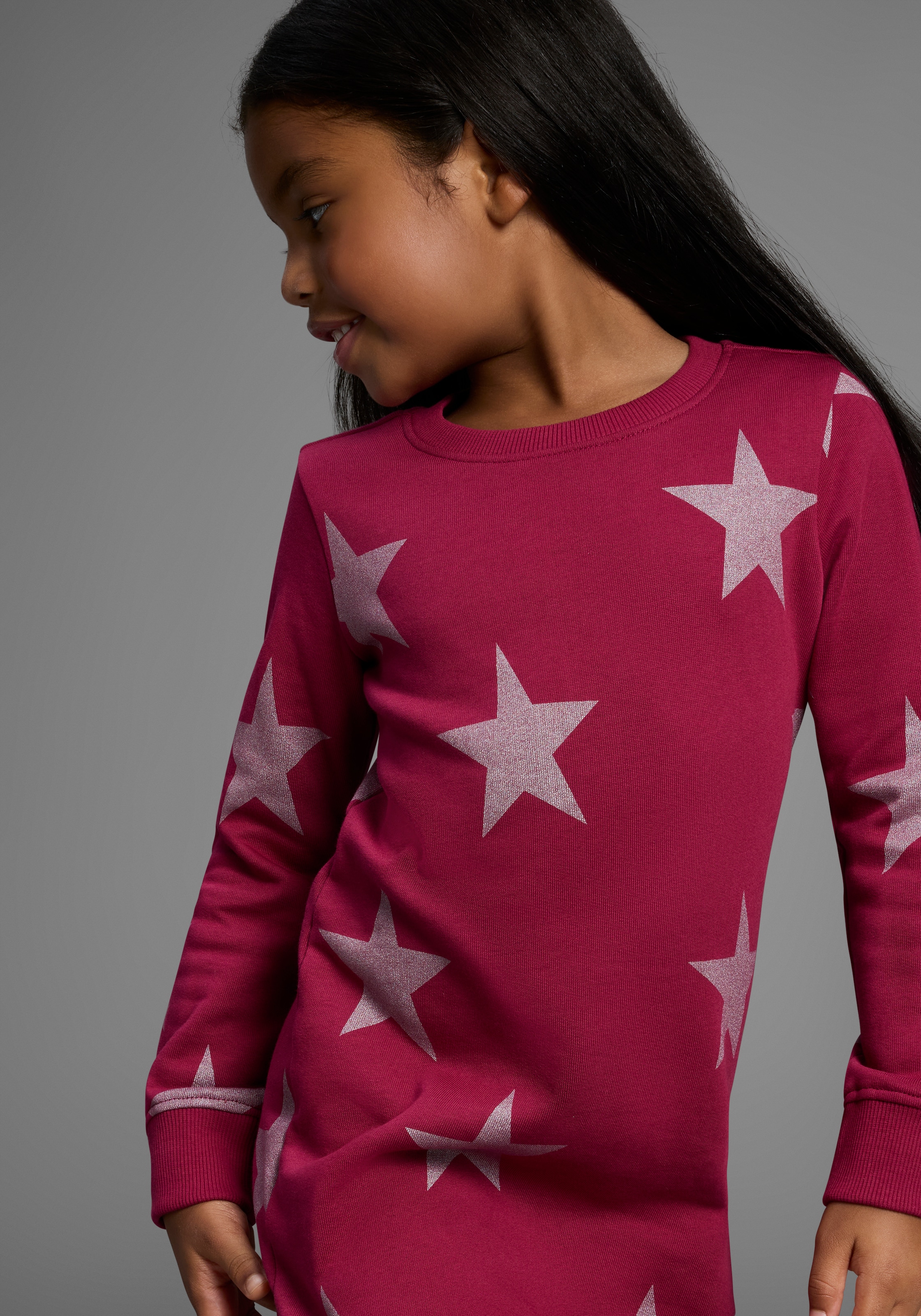 KIDSWORLD Sweatkleid »Sterne-Allover Kleid für kleine Mädchen«, Sweatkleid mit Glitzerdruck