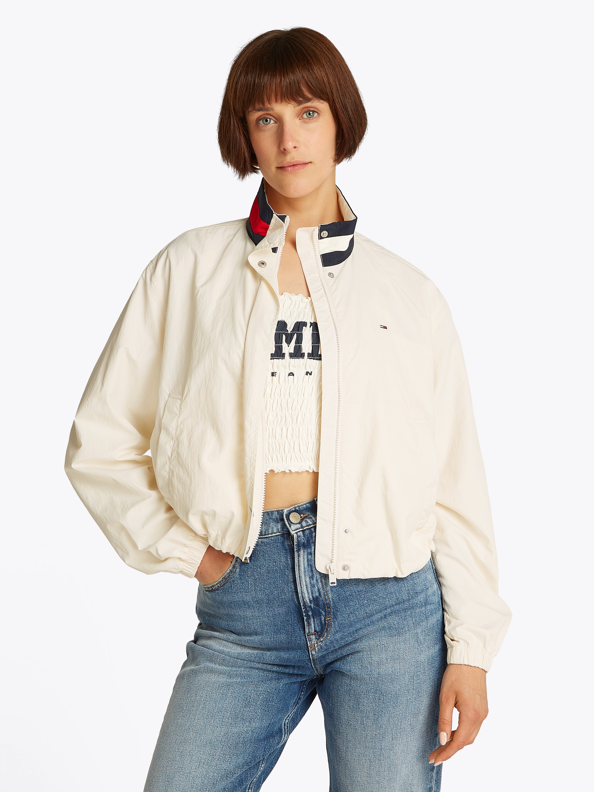 Tommy Jeans Outdoorjacke "TJW ESSENTIAL JACKET EXT", mit kontrastfarbenem E günstig online kaufen