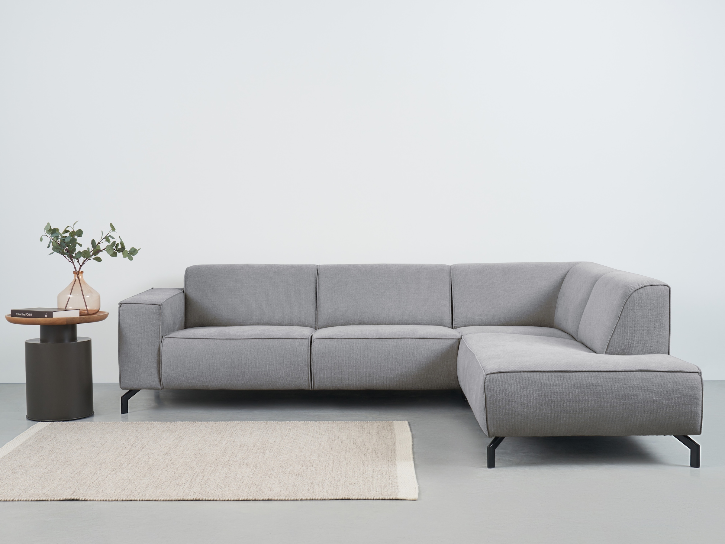 Places of Style Ecksofa Lorcan, in Lederoptik oder Strukturstoff lieferbar