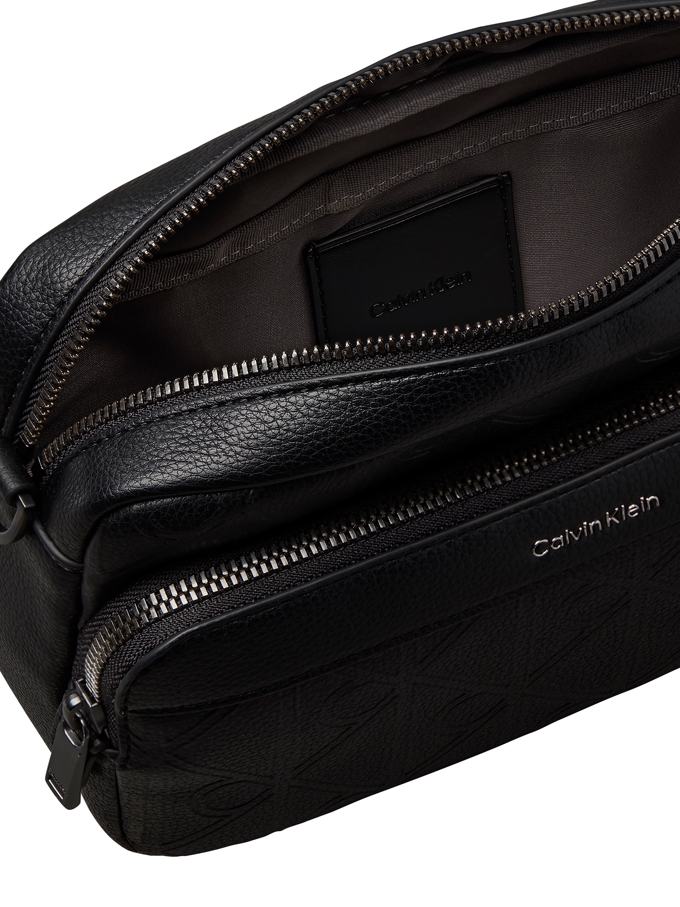 Calvin Klein Umhängetasche »EMBLEM AOP DEBOSS CAMERA BAG« Crossbody Bag, Schultertasche mit CK-Logoprägung und Fronttasche