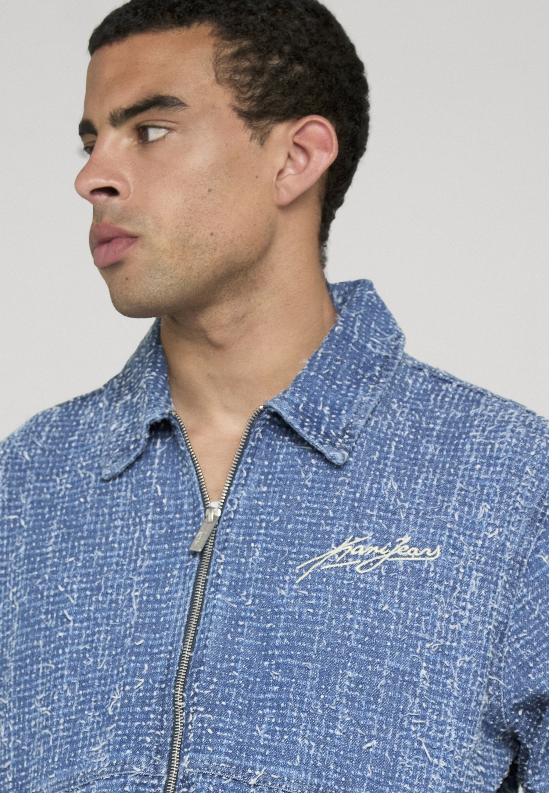 Karl Kani Jeansjacke »Karl Kani Kani Jeans Distressed Zip Denim Jacket« 1 Stk. tlg. ohne Kapuze