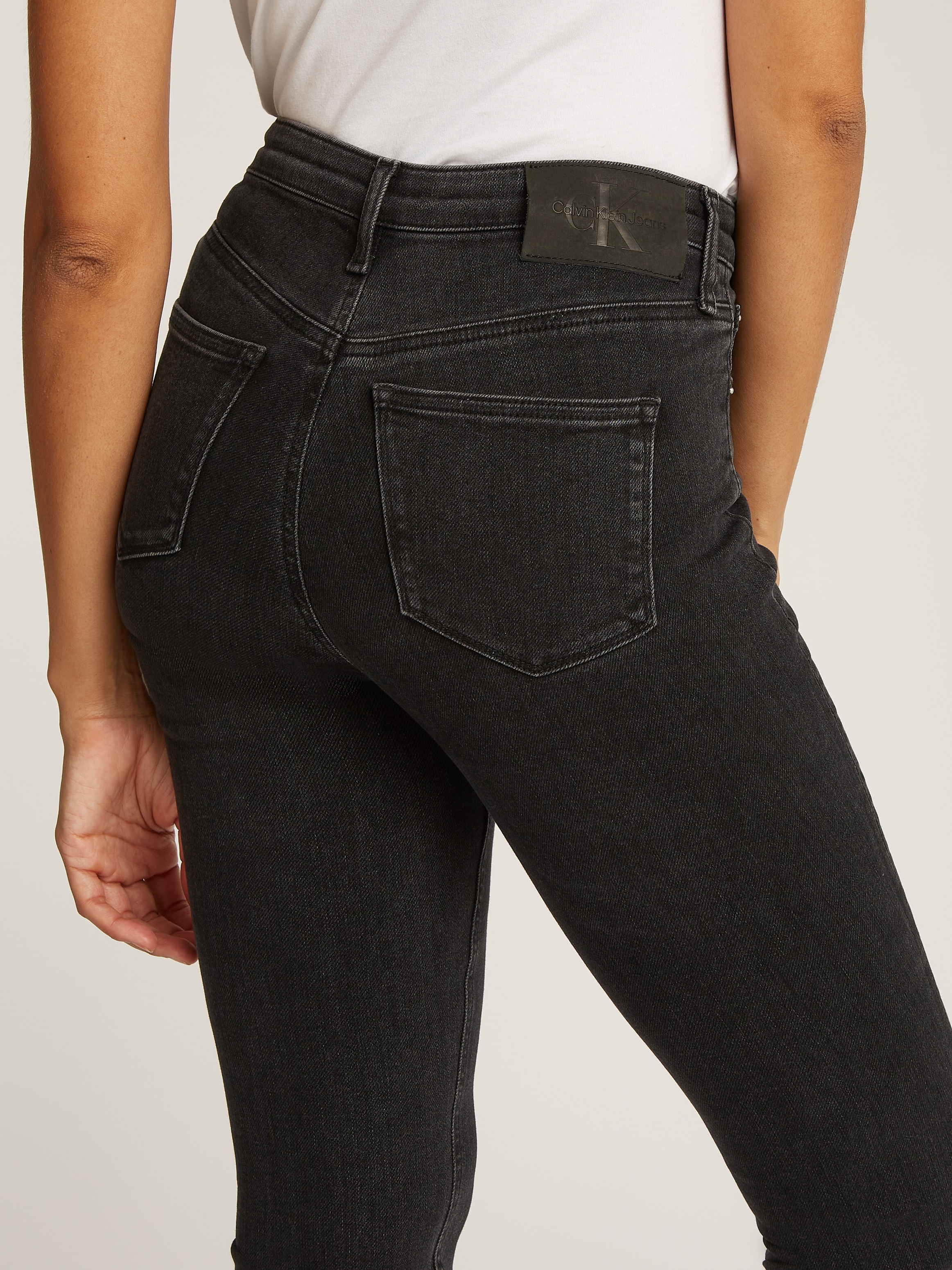 Calvin Klein Jeans Skinny-fit-Jeans »HIGH RISE SUPER SKINNY«, mit stoned wash Optik, mit Coinpocket