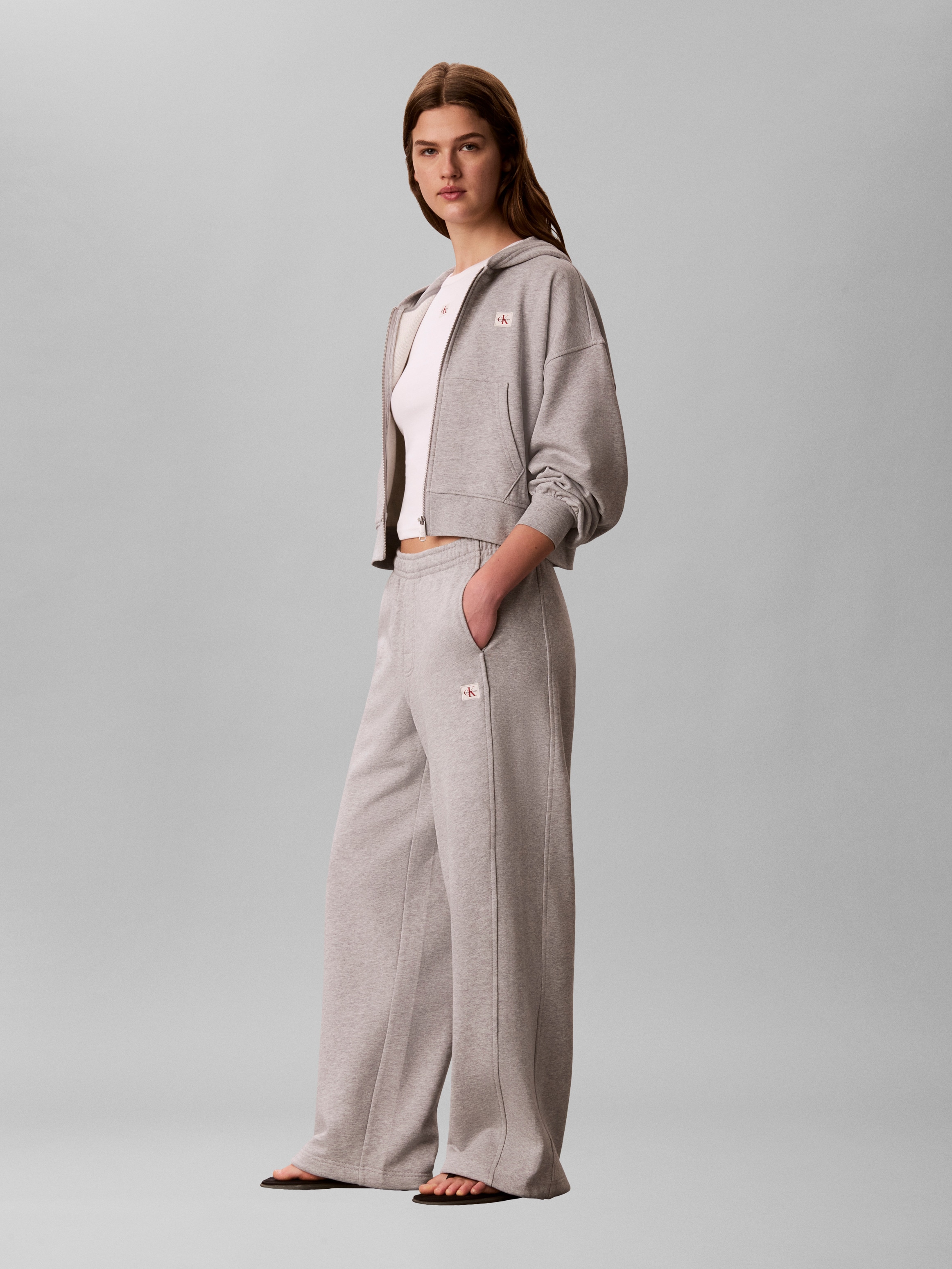 Calvin Klein Jeans Sweathose »A- FRENCH TERRY BADGE LOGO PANT«  mit weitem Bein