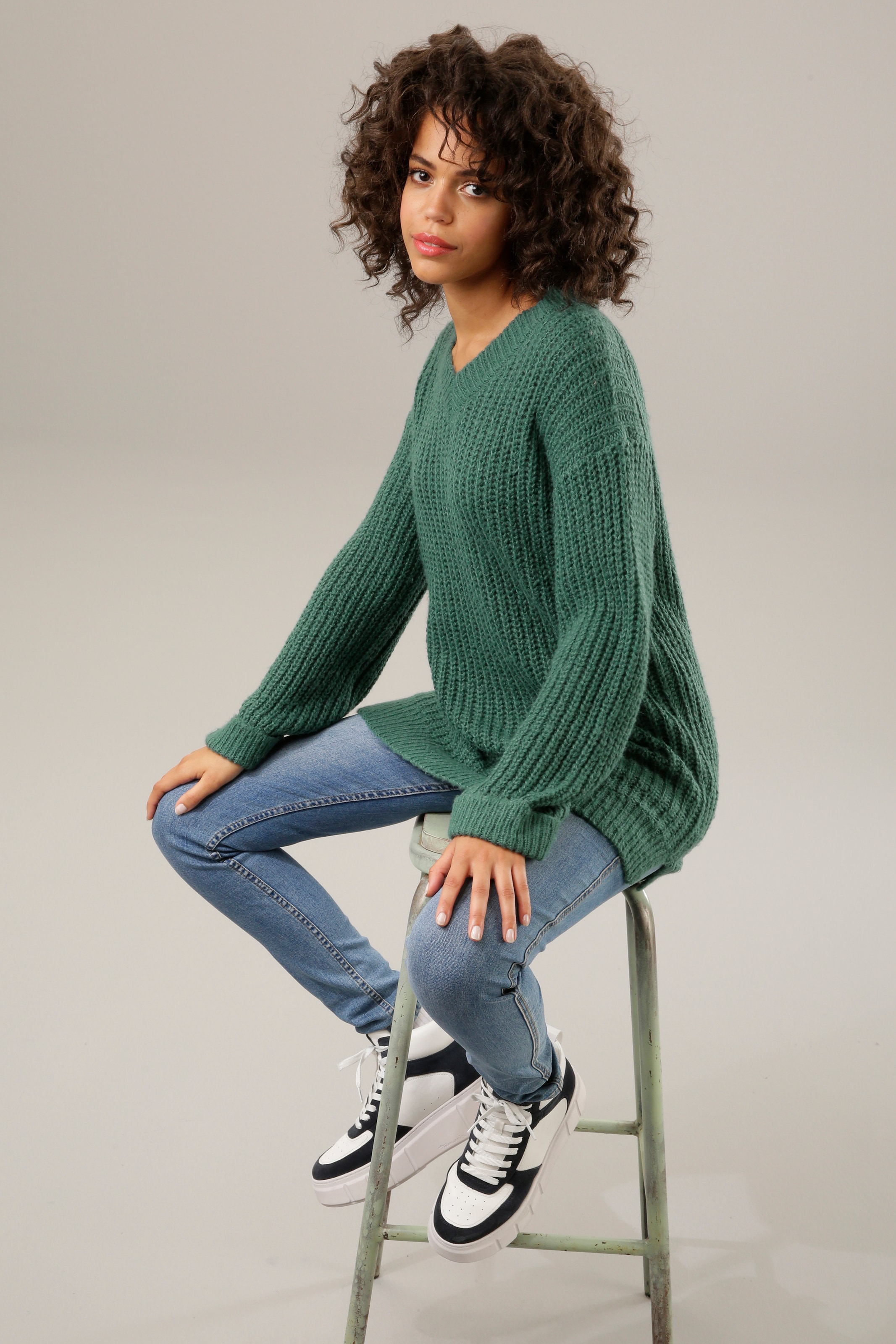 Aniston CASUAL Longpullover, mit fixierten Umschlag an den langen Ärmeln