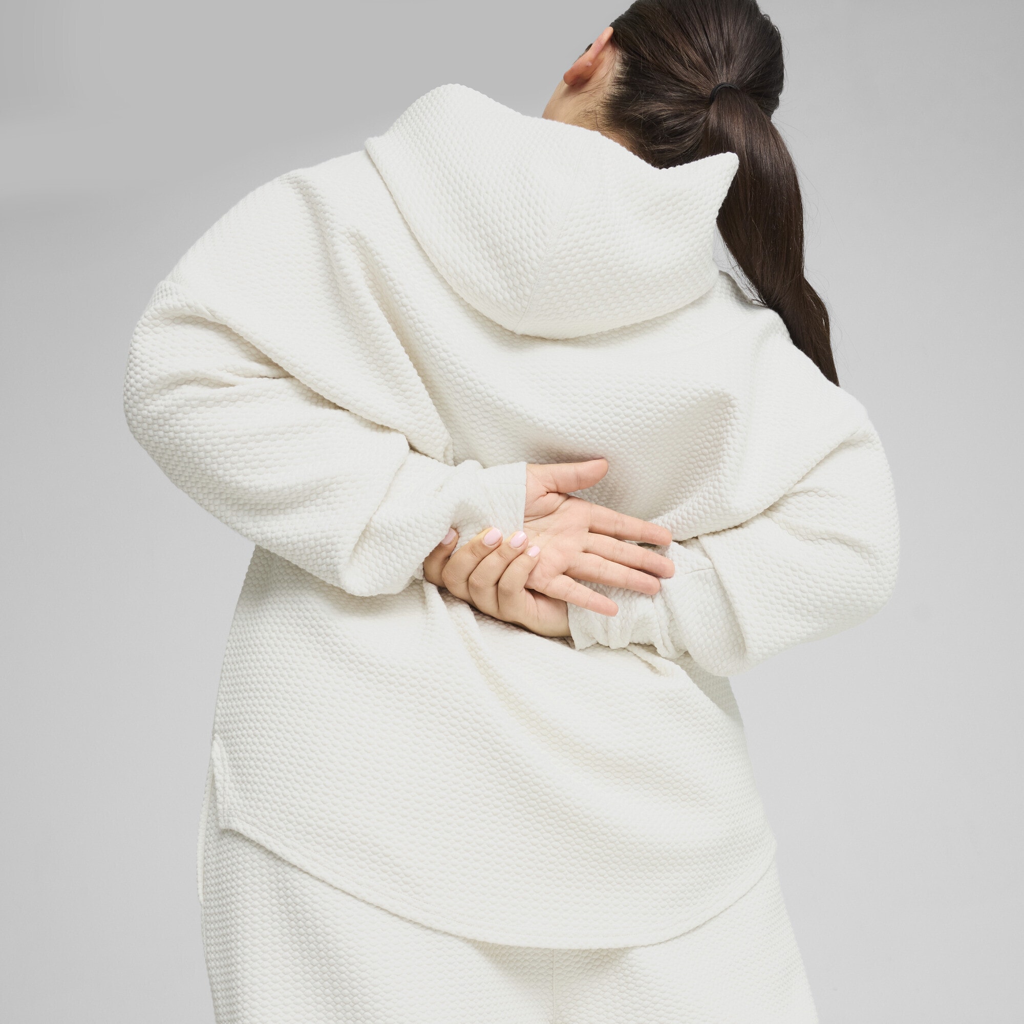 PUMA Kapuzenpullover »STUDIO Textured Hoodie Damen«