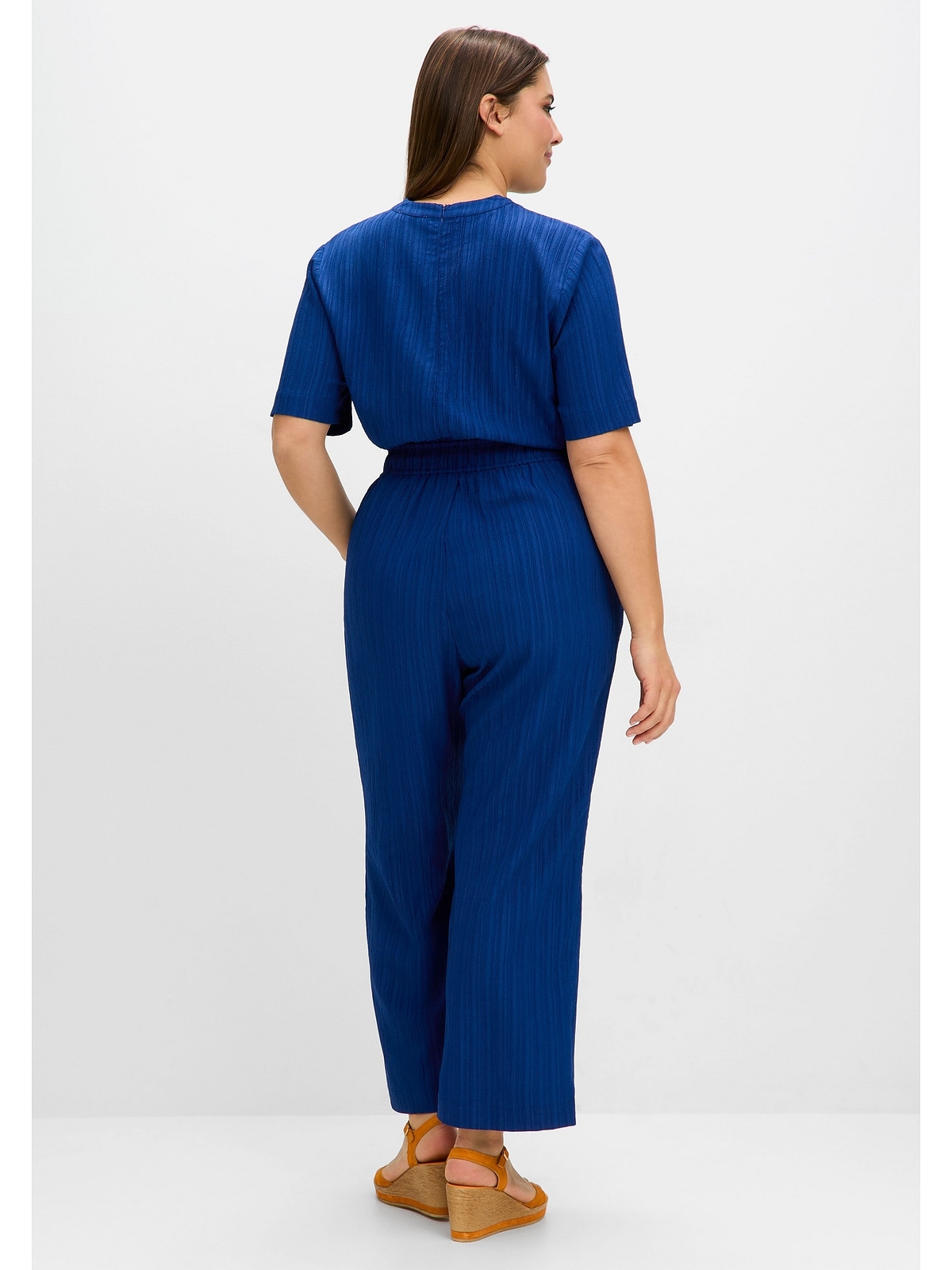 Sheego Jumpsuit »Große Größen«, mit Bindegürtel, in Längsstruktur