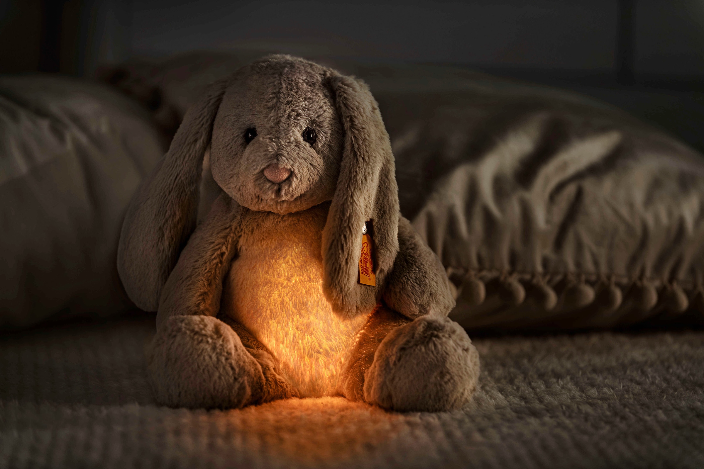 Steiff Kuscheltier »Light at Night Hoppie Hase sitzend, 28 cm«, Nachtlicht