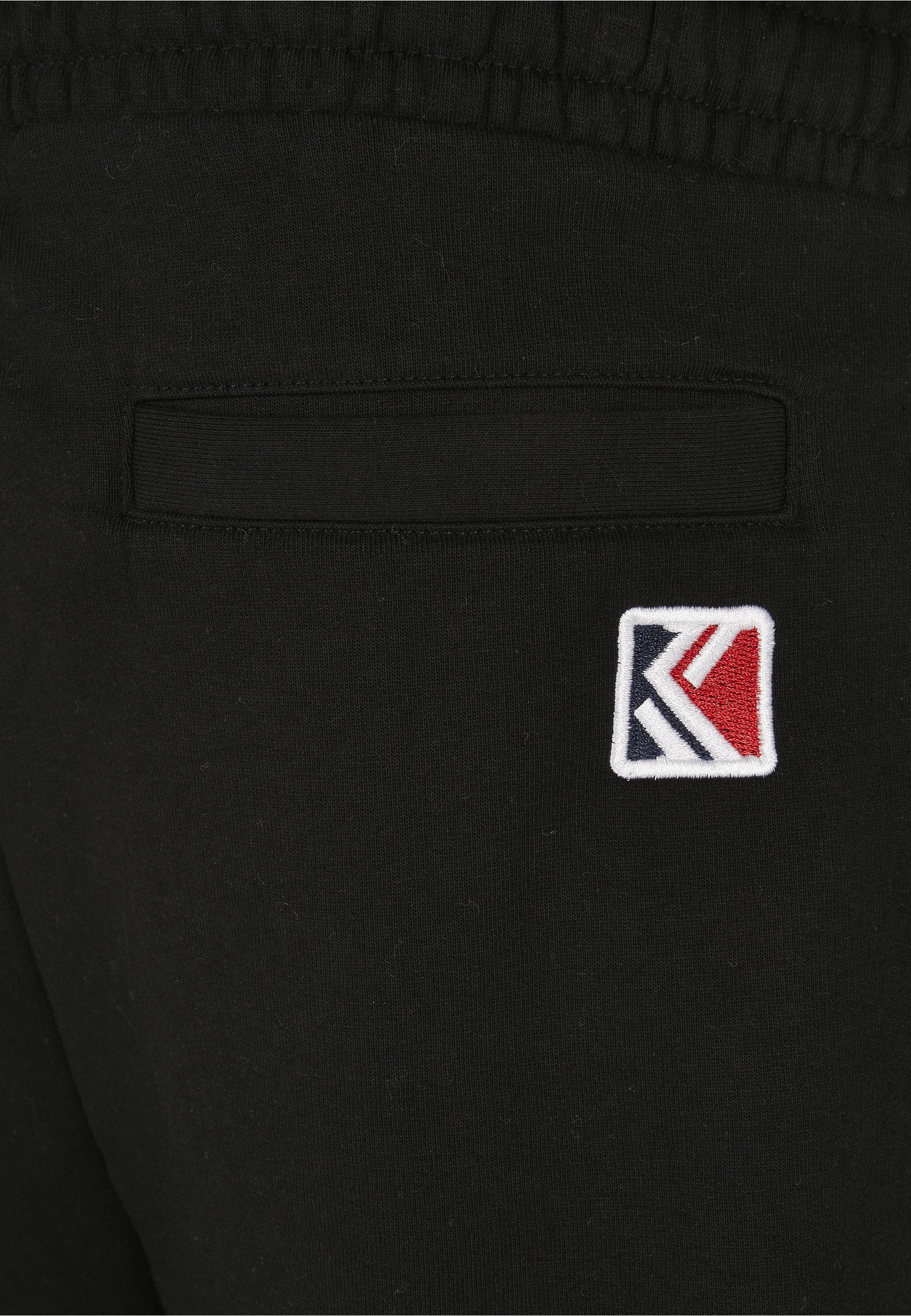 Karl Kani Stoffhose »Karl Kani Herren KKMQ12007 SIGNATURE RETRO SWEATPANTS BLK«